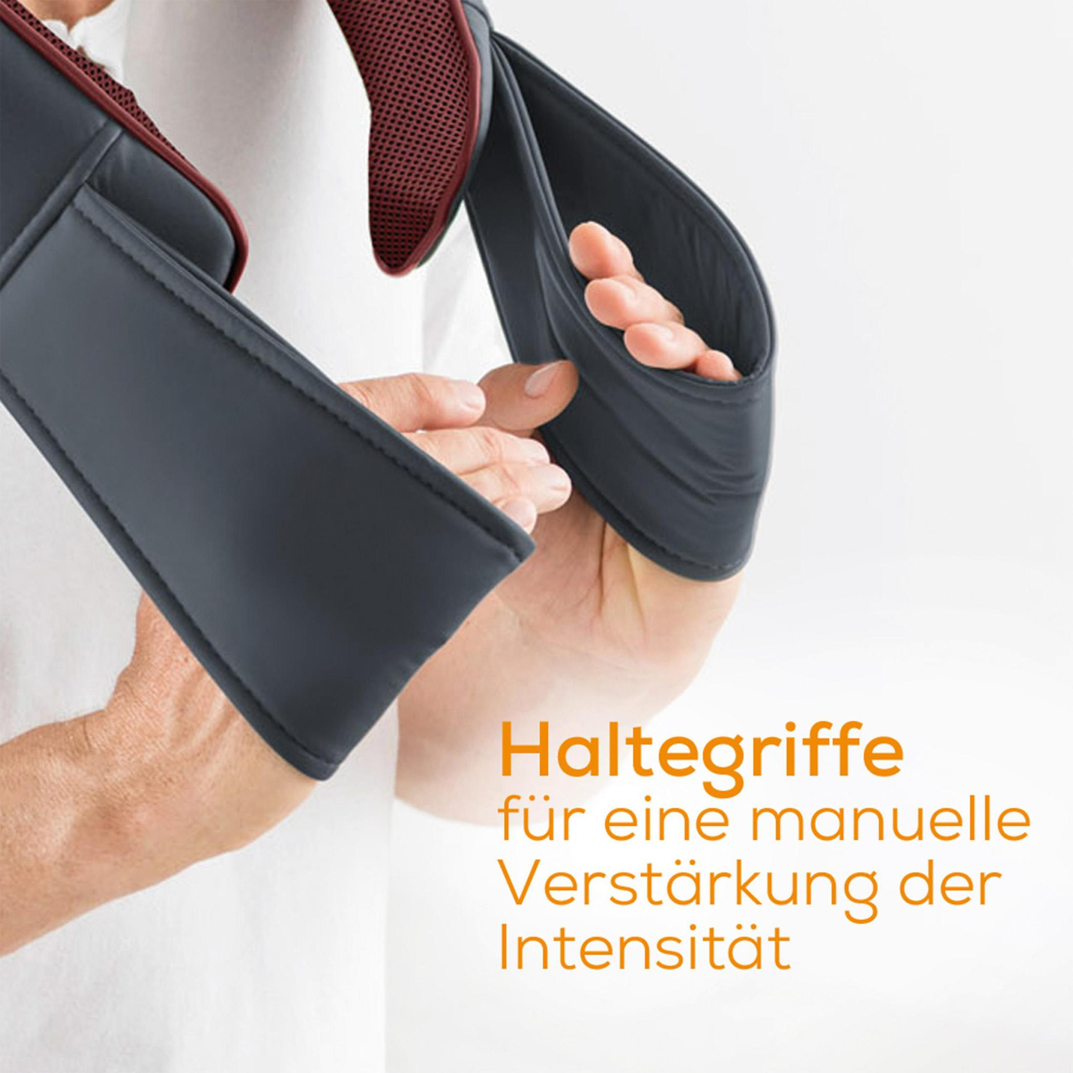 Nahaufnahme eines Massagegeräts mit Text in Orange. Eine Hand hält das Gerät.