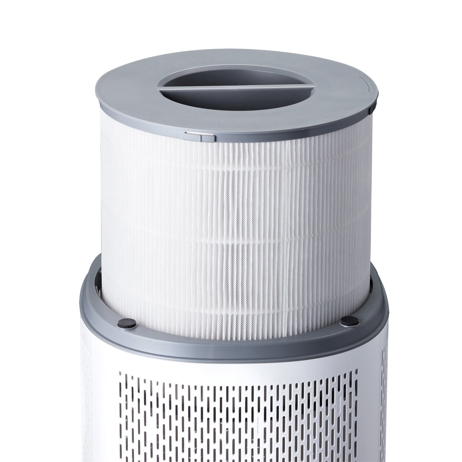 An air purifier filter. It is cylindrical, with a white pleated filter within a gray frame.