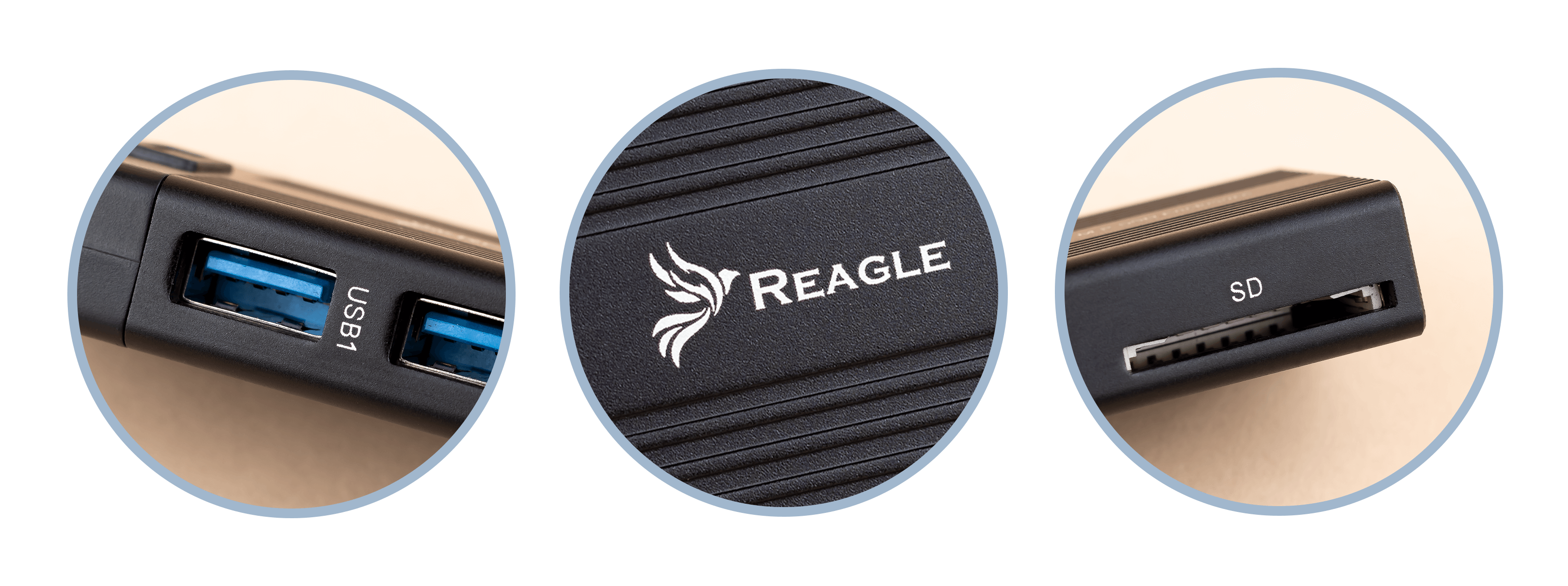 Zbliżenie czarnego urządzenia z portami USB i SD. Widoczne logo Reagle.