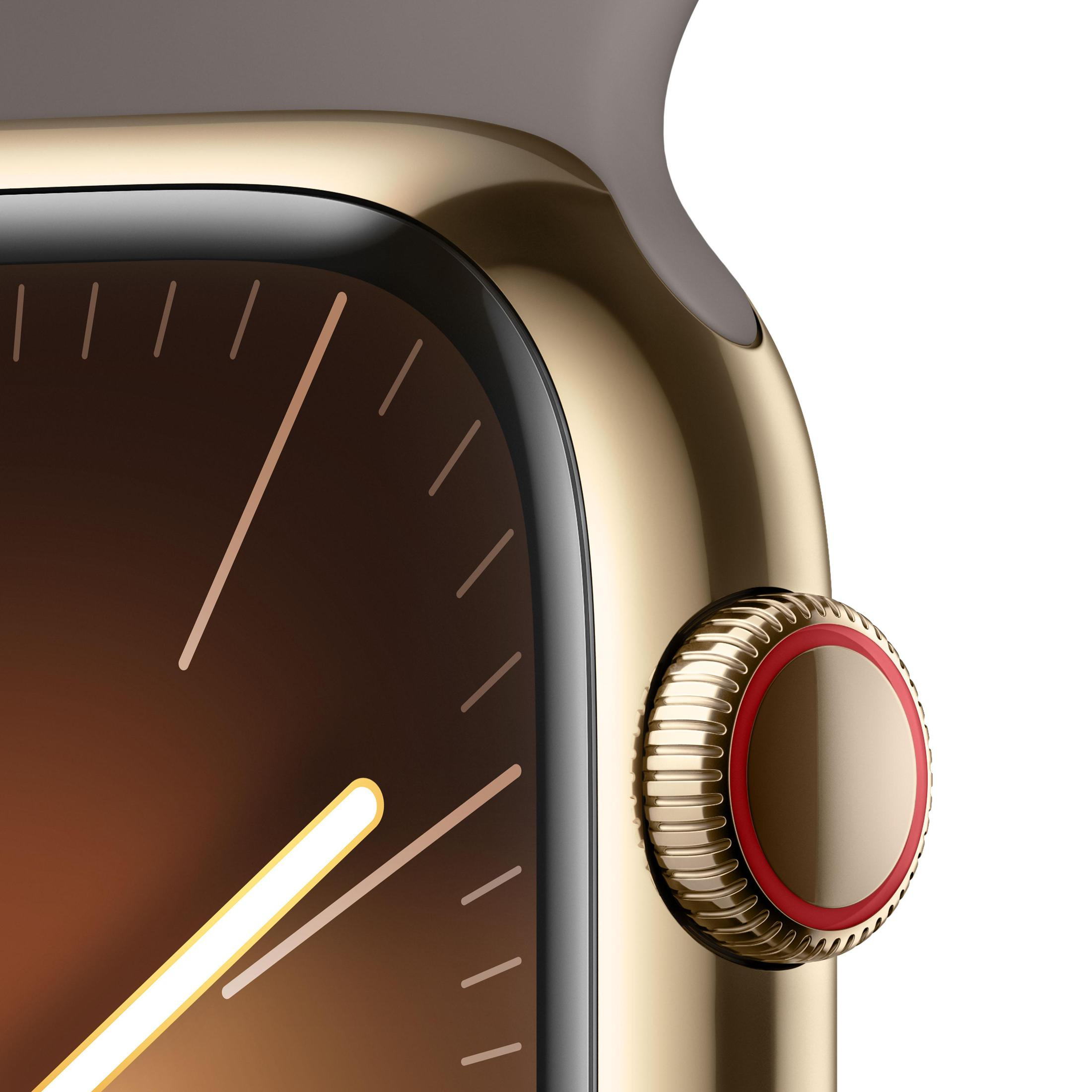 Nahaufnahme einer goldenen Apple Watch. Goldene Uhr mit rotem Detail.