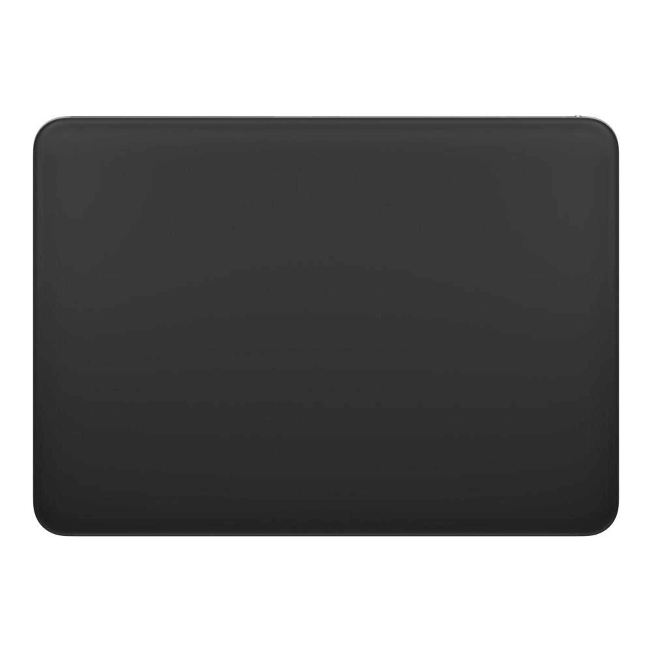 Ein rechteckiges, schwarzes Objekt, wahrscheinlich ein Laptop-Deckel, von oben betrachtet.