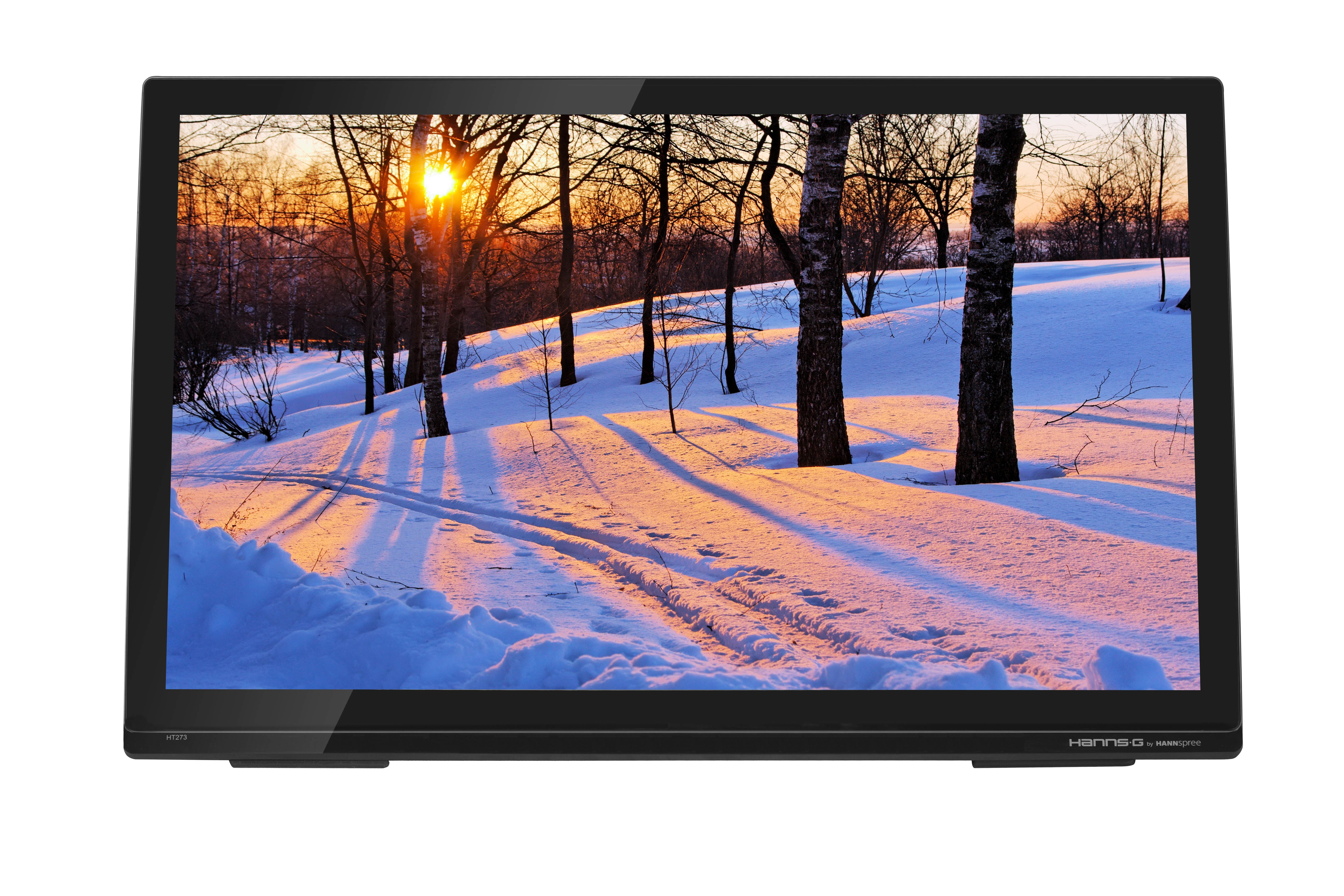 Un monitor che mostra una scena invernale con neve, alberi e un tramonto. Lo schermo ha un bordo nero.