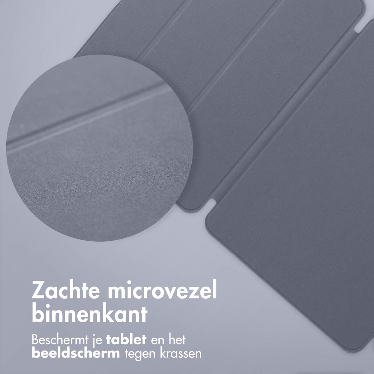Close-up of a gray tablet cover with text about a soft microfiber interior.