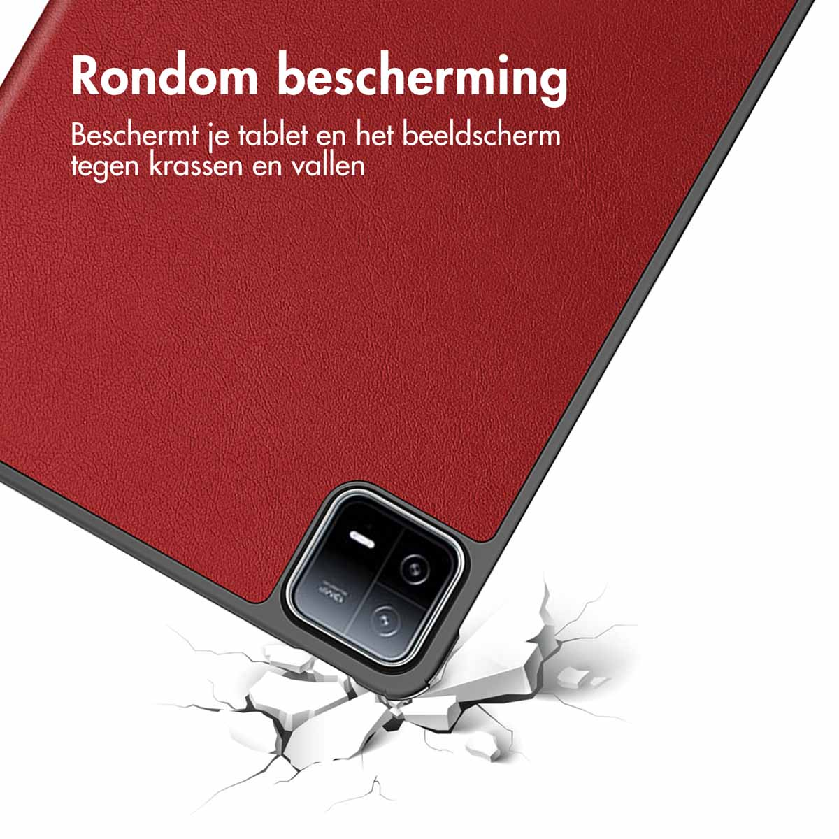 A red tablet case with a black camera cutout and a white surface cracked from impact.