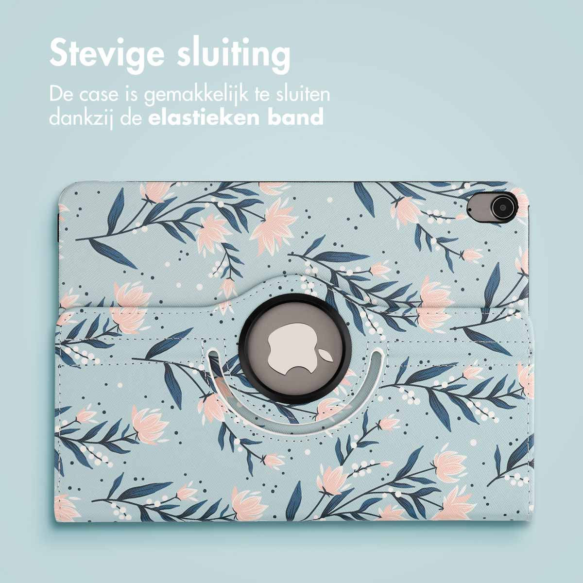 Tablette dans un étui à motifs floraux, avec un logo Apple et une sangle pour fermer l'étui.