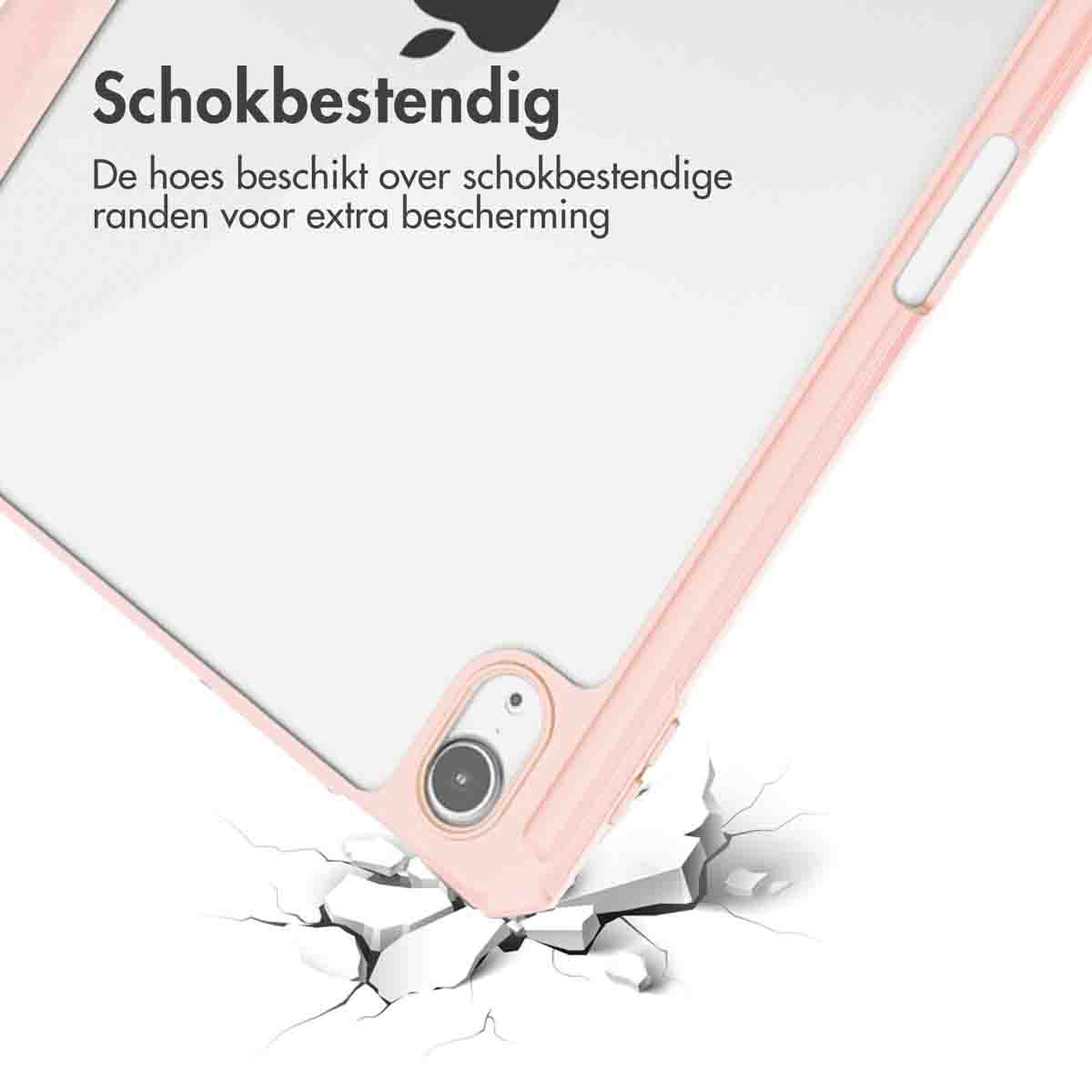 Tablet case corner, pink, being dropped. Text: Shockproof. White background. Cracks appearing below the case.