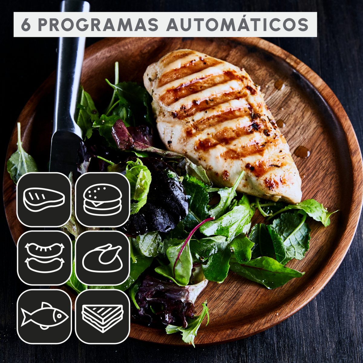 Pollo a la plancha en plato de madera con ensalada. Mostrando iconos para diferentes configuraciones de alimentos.