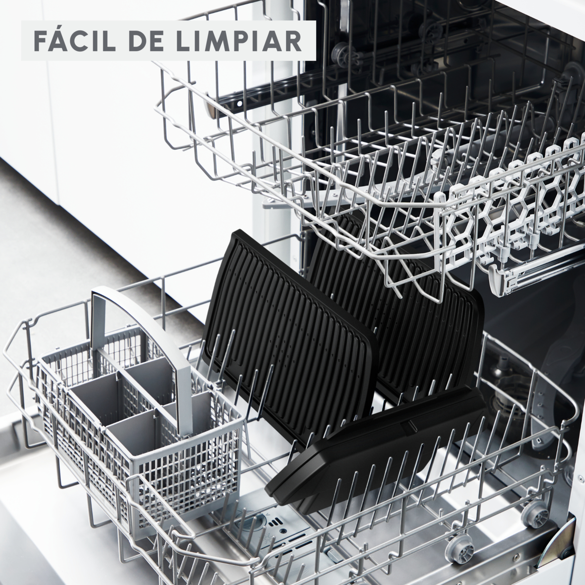 Lavavajillas con parrillas negras y una cesta. Tiene las palabras "Fácil de limpiar".