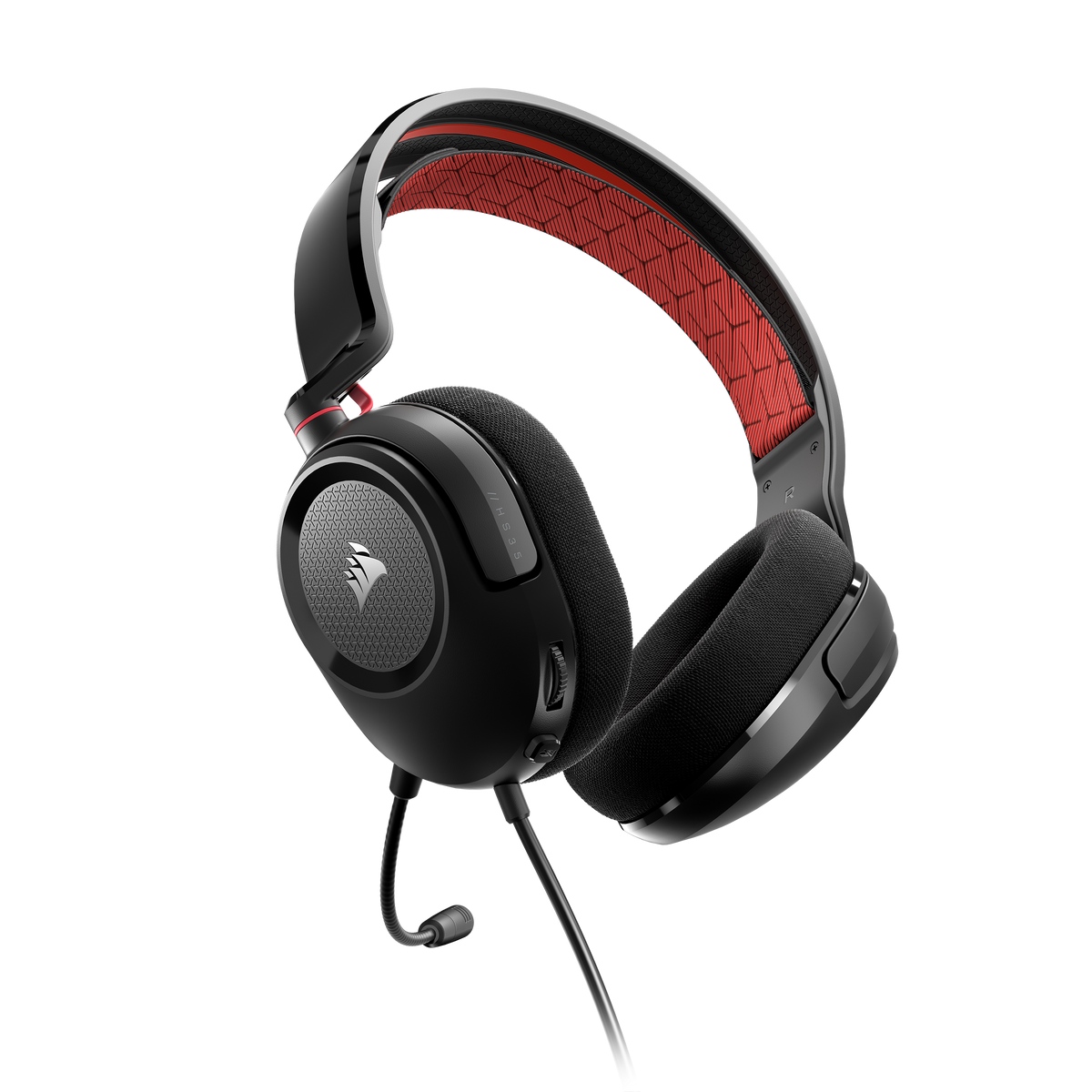 Ein schwarzes Headset mit rotem Netz am Bügel. Mikrofon und Bedienelemente sichtbar. Schwarzer Hintergrund.