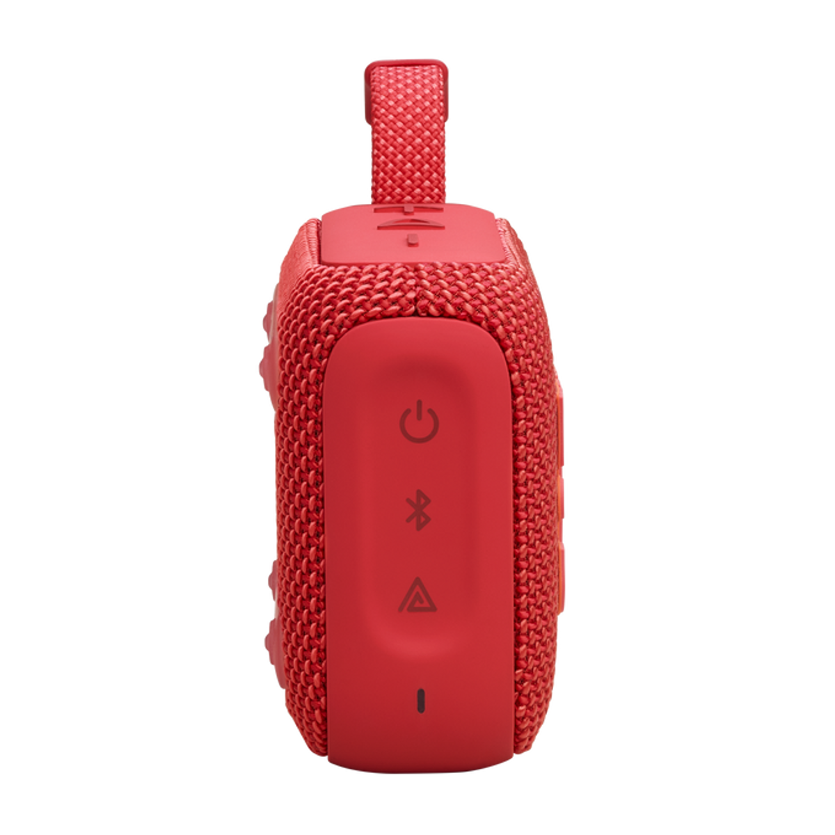 Czerwony, prostokątny głośnik z paskiem. Pokazuje przyciski zasilania, Bluetooth i głośności z przodu.