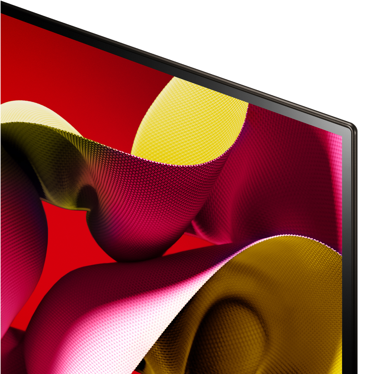 Primer plano de la esquina de una pantalla de TV. Formas abstractas rojas y amarillas sobre fondo negro.