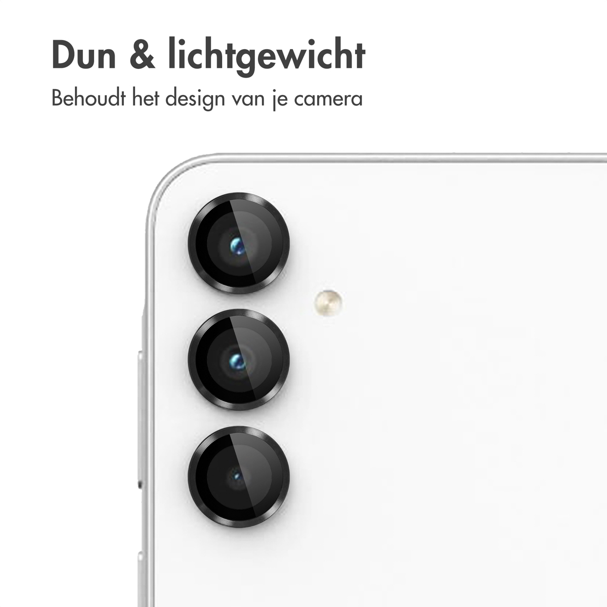 Close-up of phone camera lenses. The phone is white, with three black lenses and a silver flash.