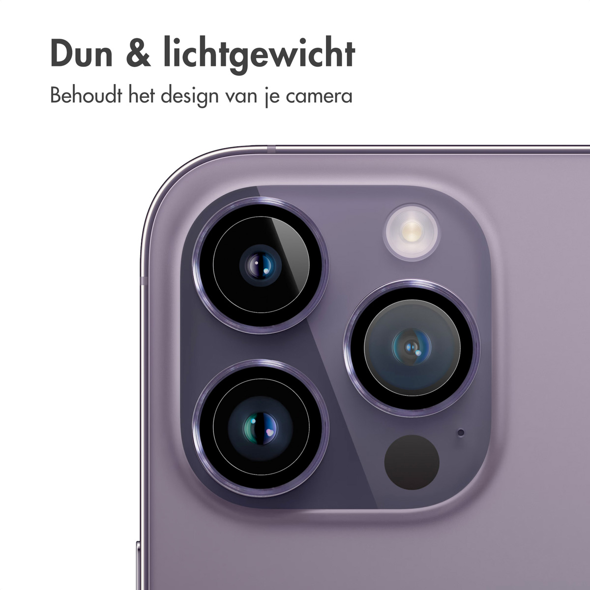 Een close-up van de cameralenzen van een telefoon. De telefoon heeft een paarse achterkant.