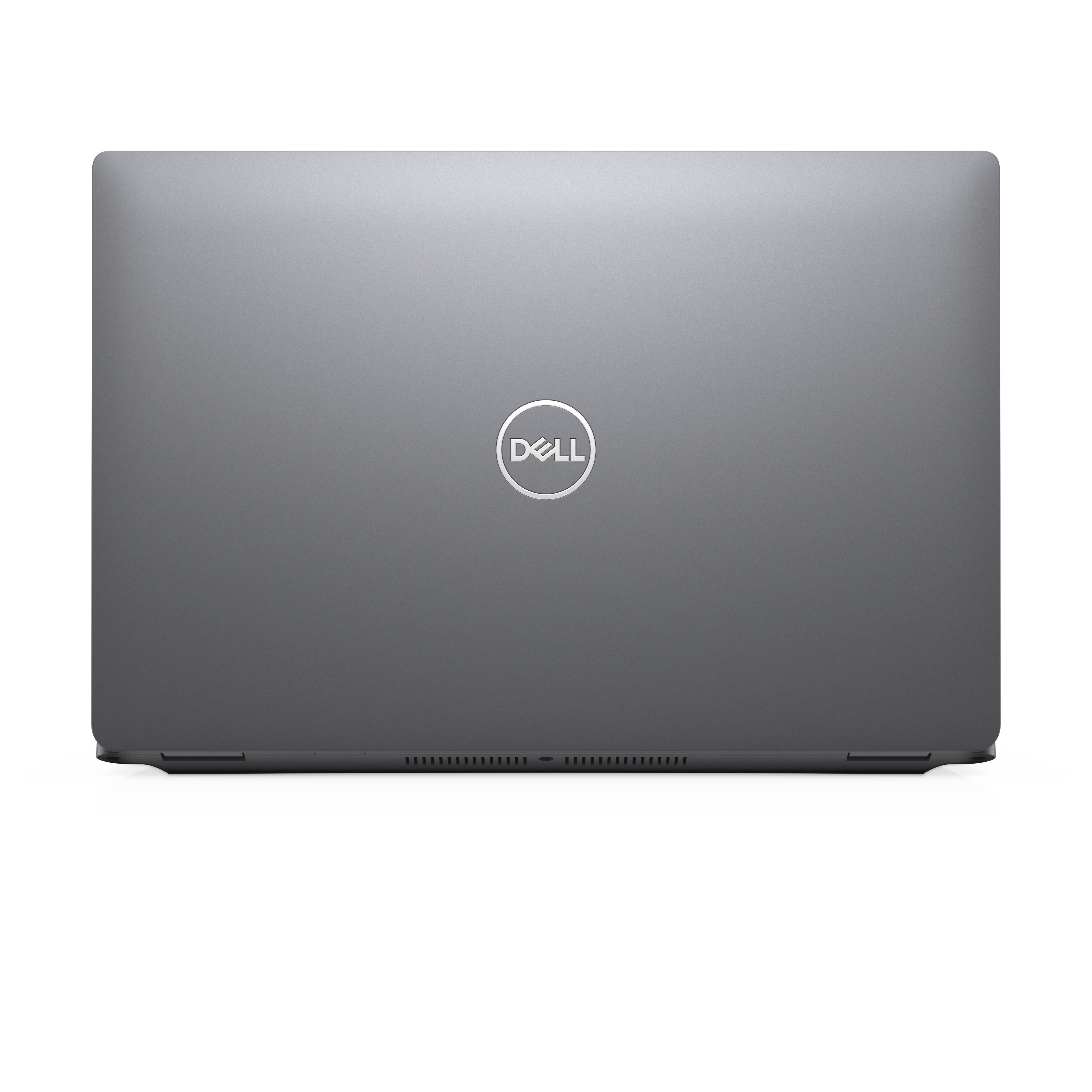 Ein geschlossener, grauer Dell Laptop, mit dem Dell Logo auf dem Deckel.
