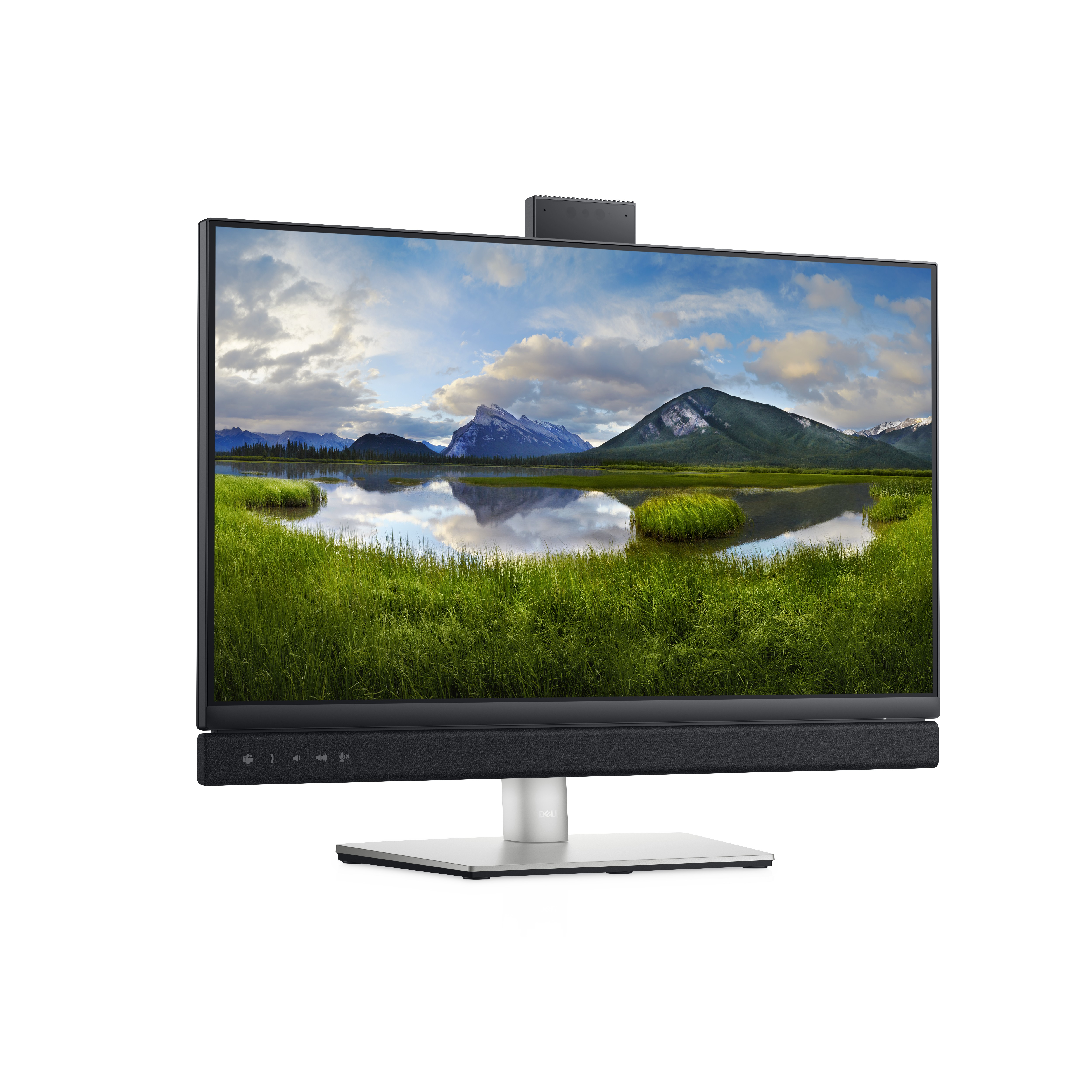 Ein Computermonitor, Lautsprecher und Webcam mit Blick auf Berge und Grün.