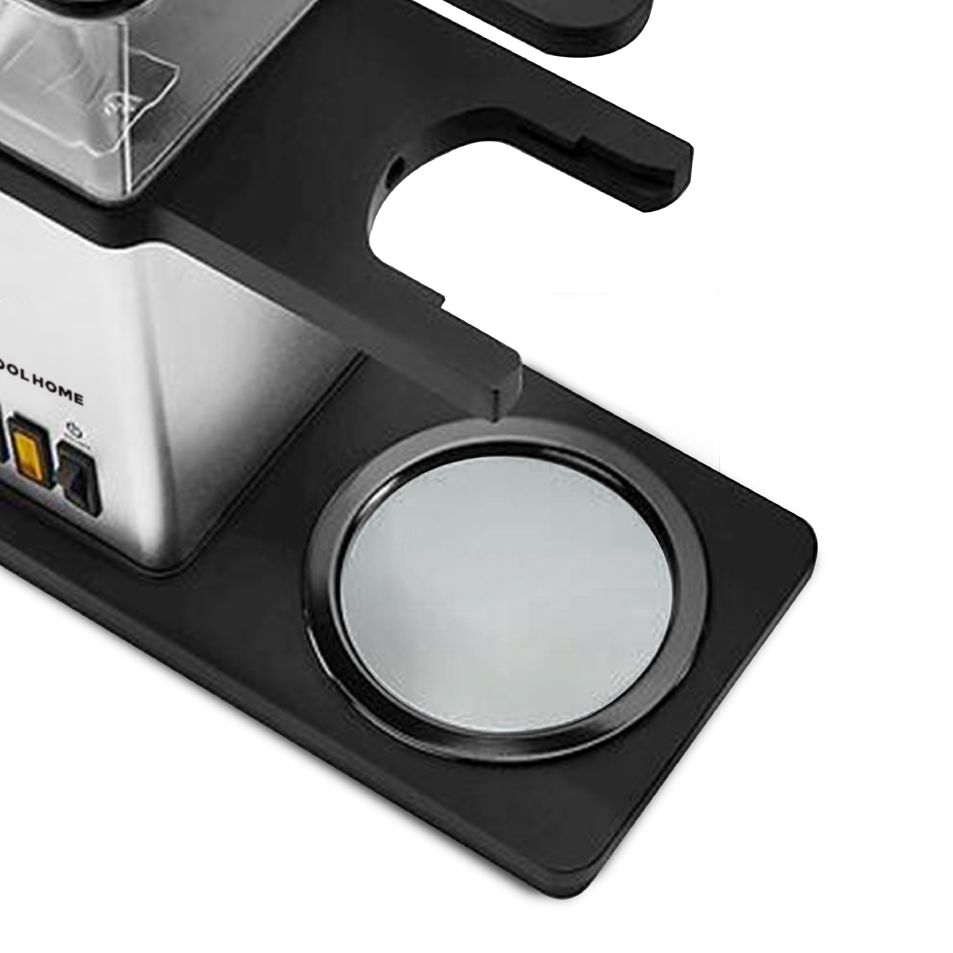 Close-up van een zwarte basis met een zilveren koffiezetapparaat. Een ronde spiegel is zichtbaar.