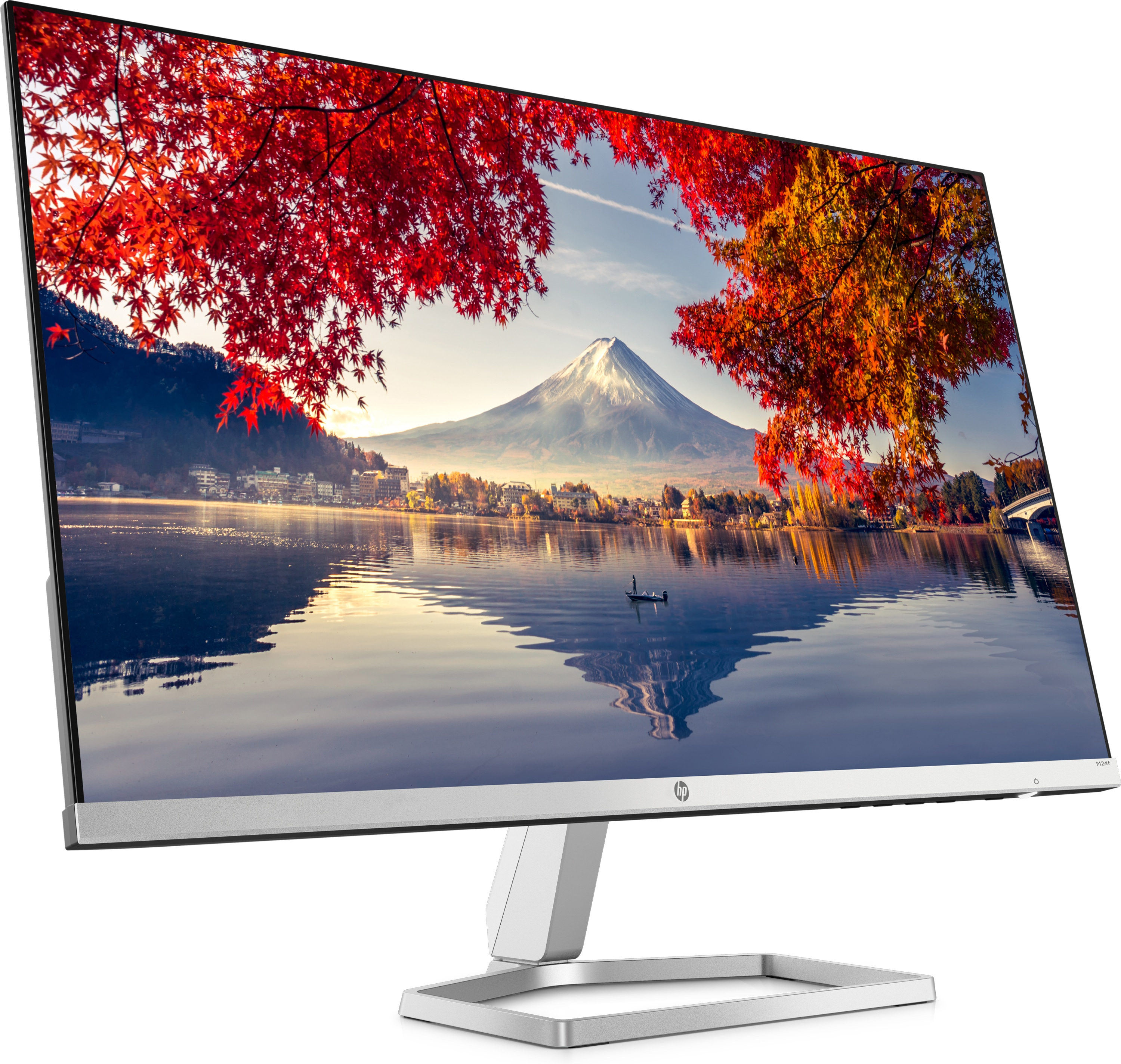 Monitor del computer che mostra una scena di montagna con alberi rossi e arancioni.