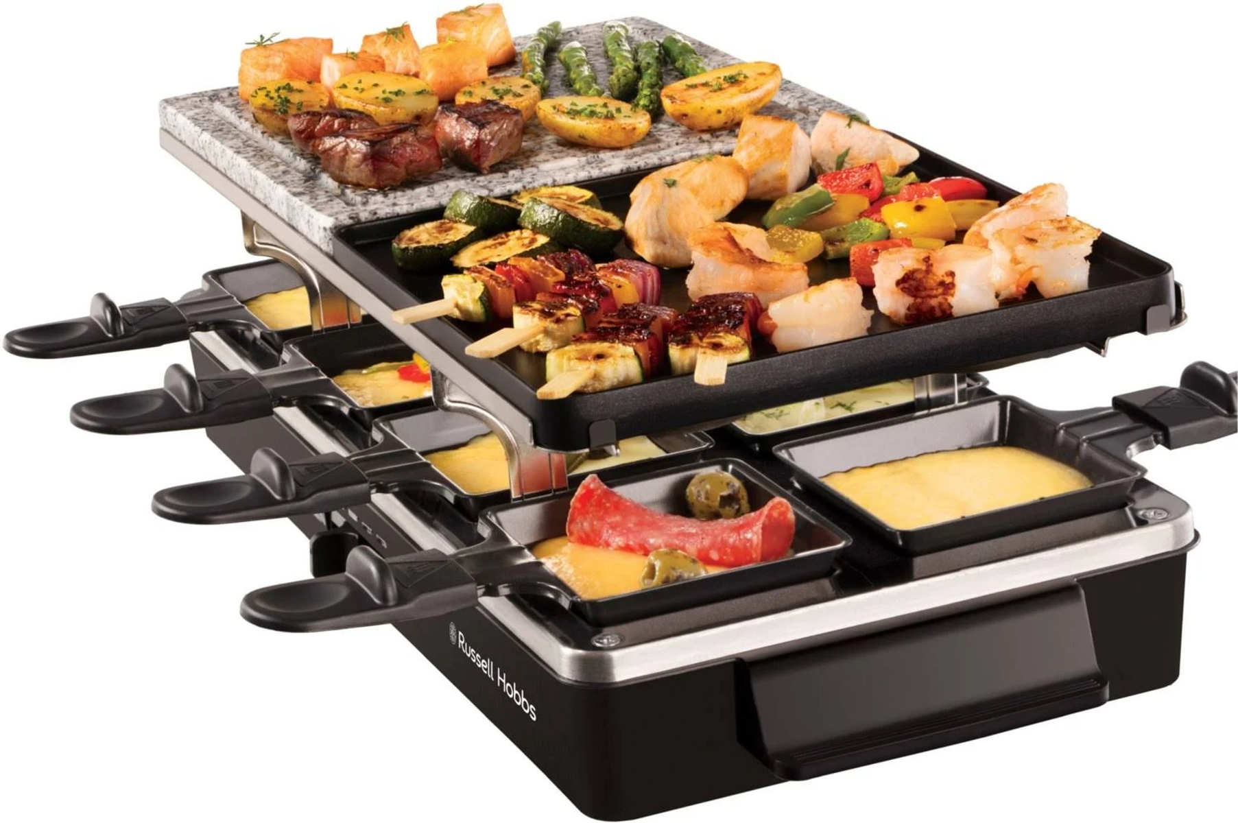 Grill do raclette z różnymi grillowanymi potrawami na wierzchu i tackami z roztopionym serem poniżej.
