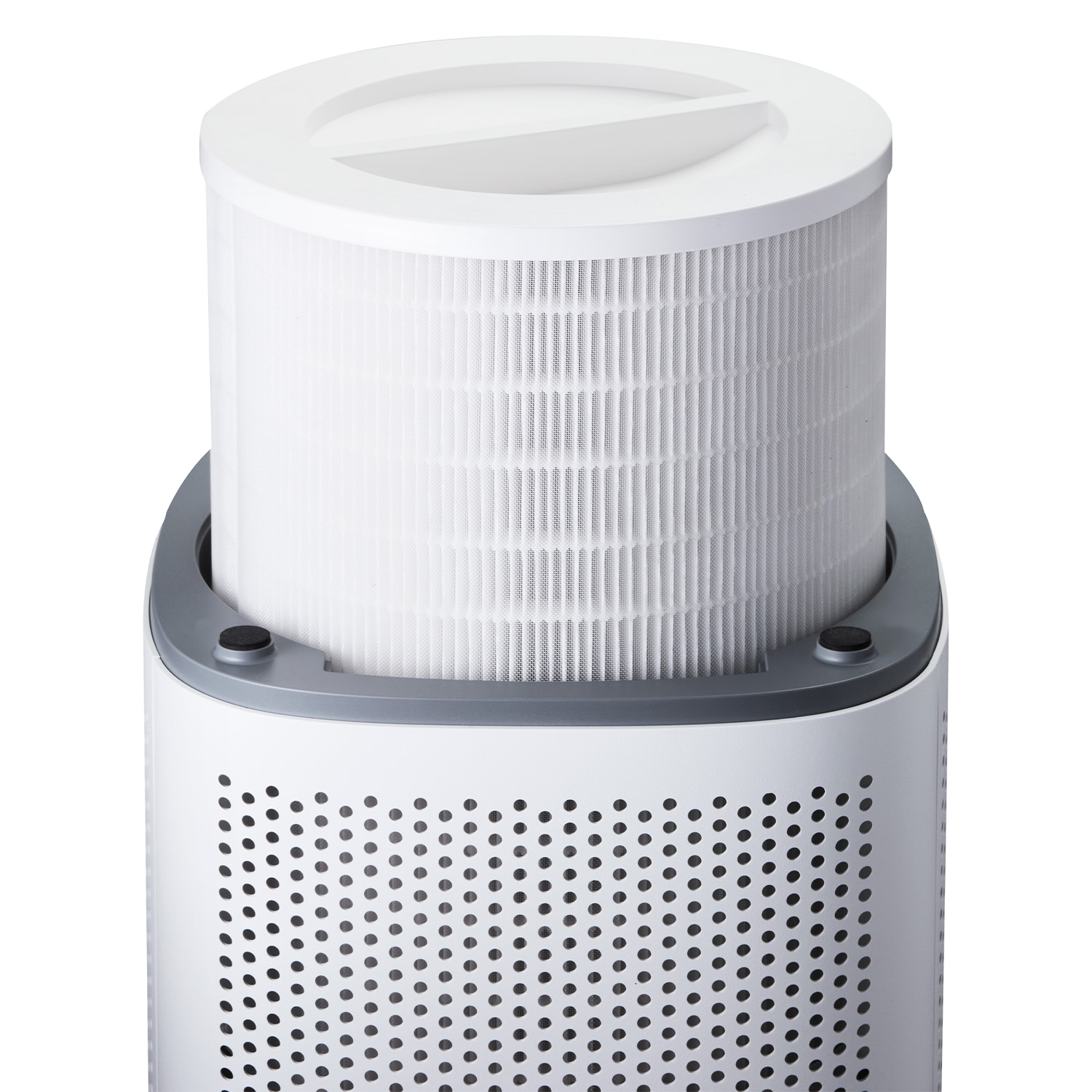 Air purifier with a white, perforated body, and a cylindrical filter visible inside.
