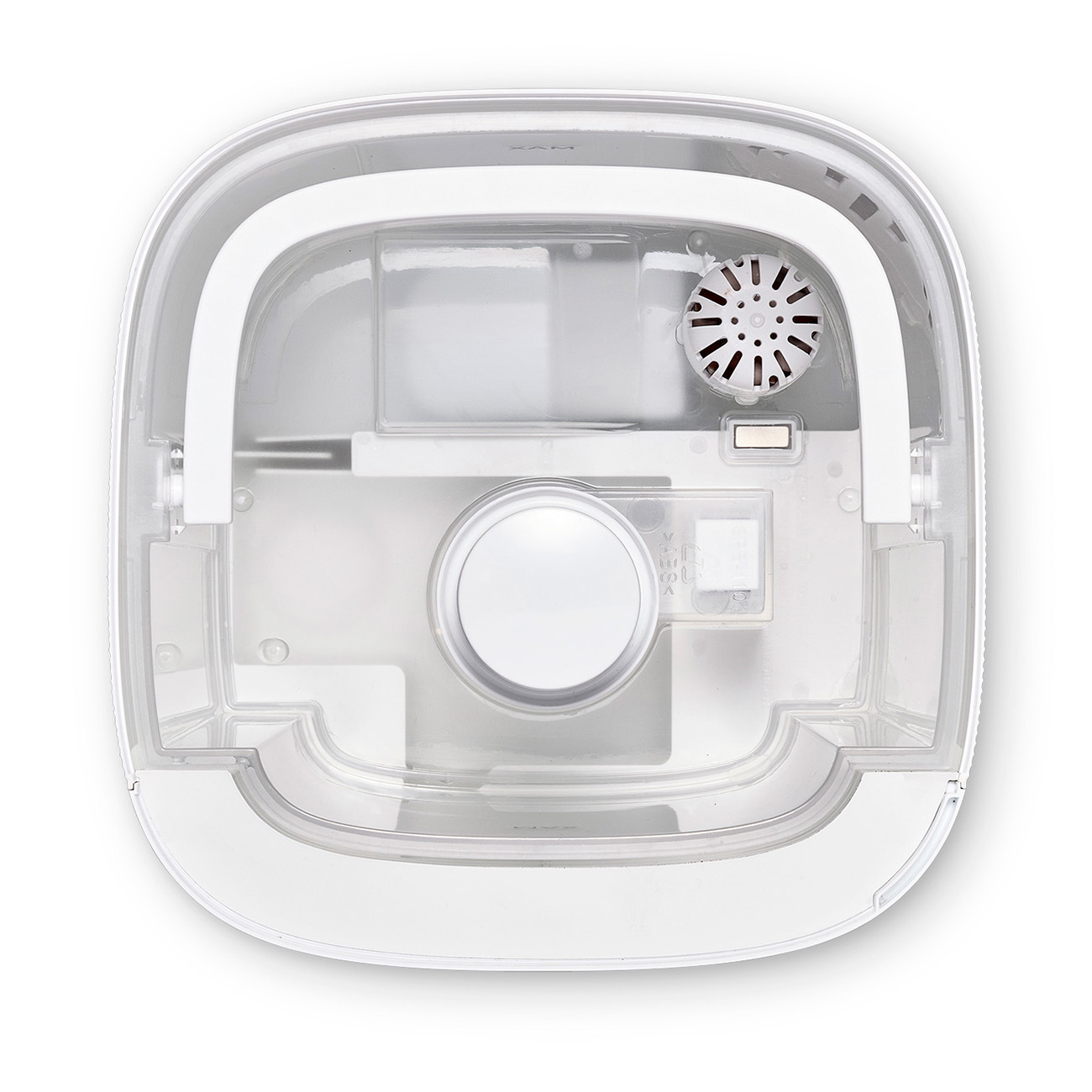 Innenraum eines weißen, transparenten Plastikgeräts, mit Ventilator und Innenteilen.