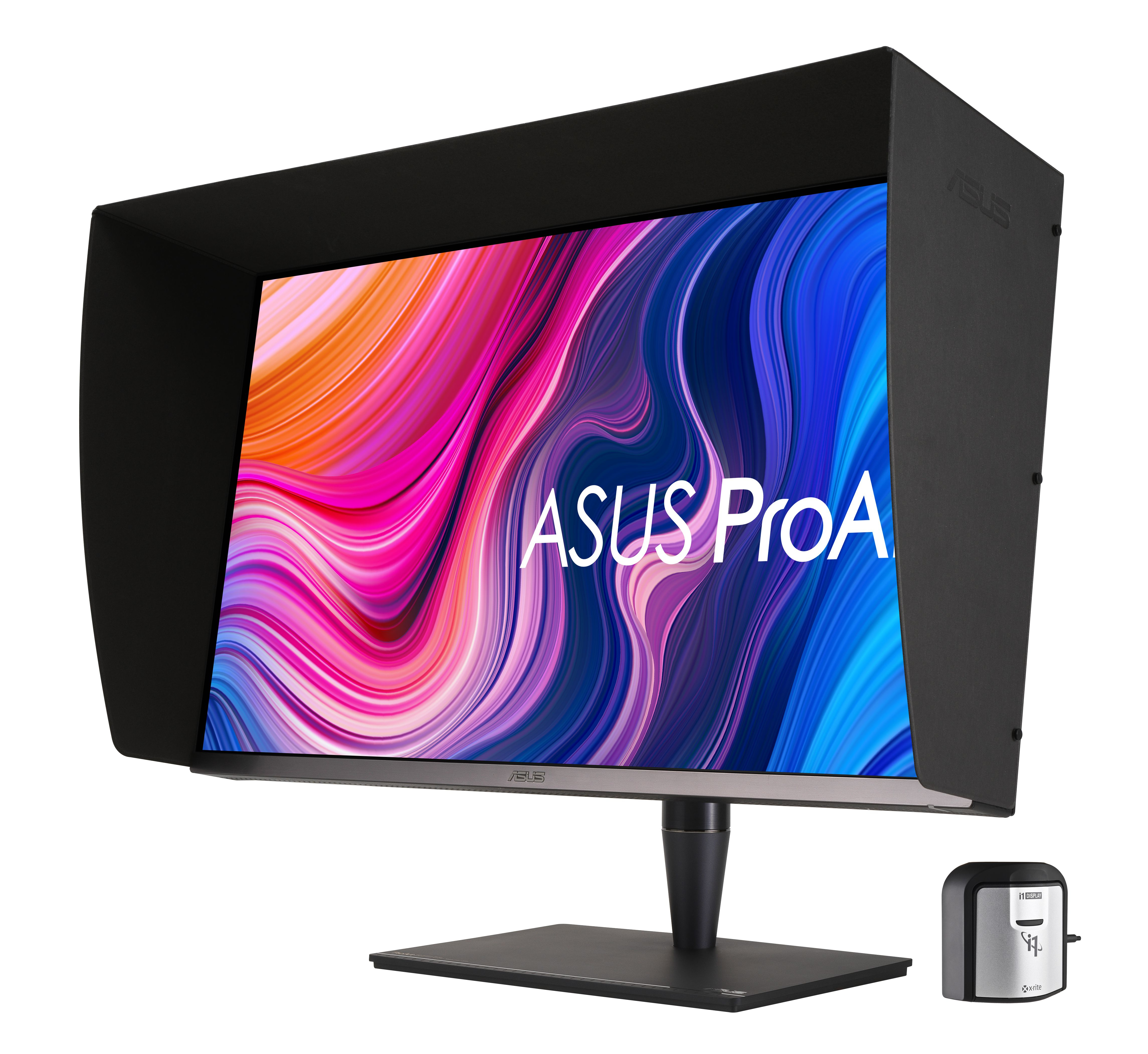 Monitor komputera z czarną osłoną i tekstem ASUS ProArt, z małym urządzeniem.