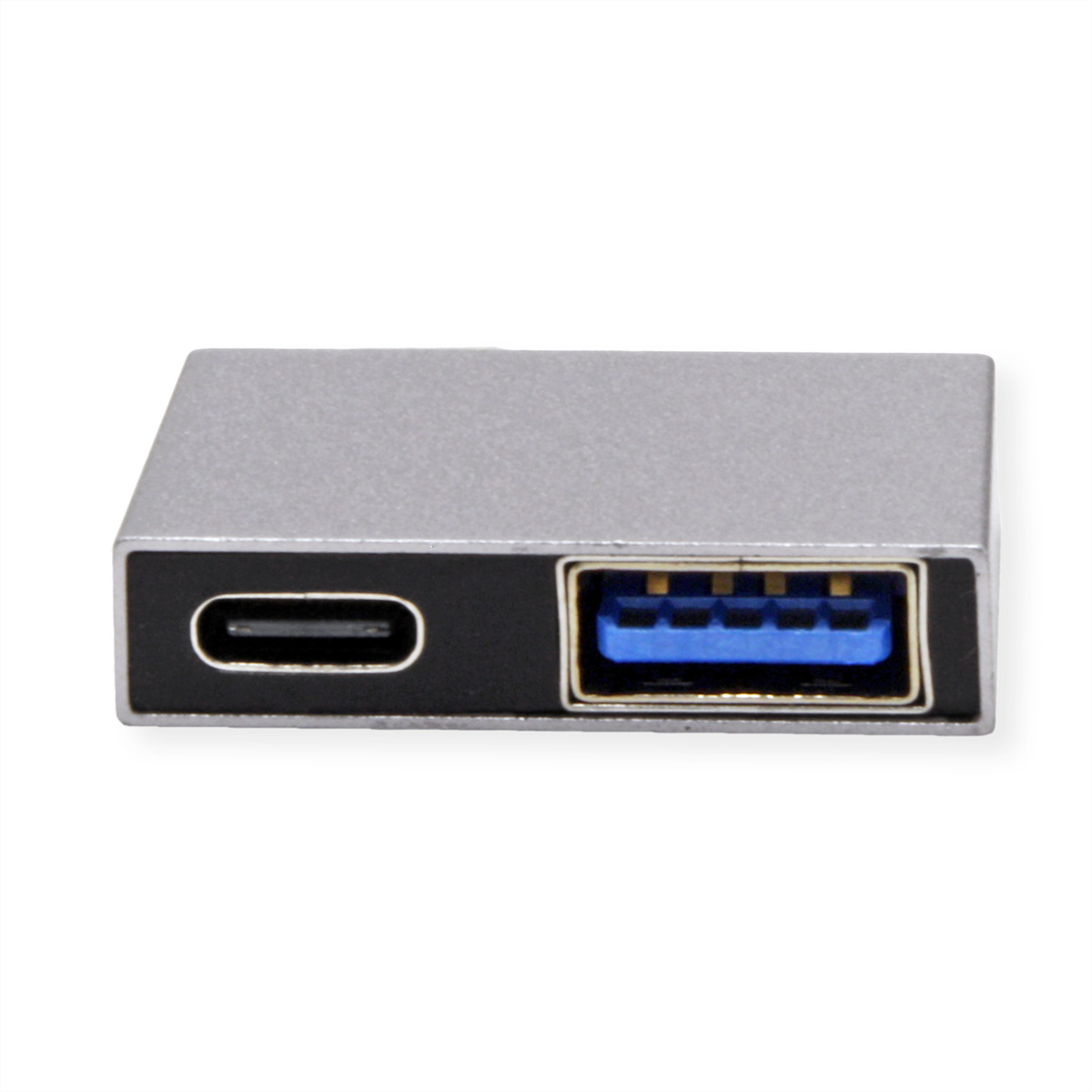 Un petit adaptateur argenté avec ports USB et USB-C. Fond blanc.