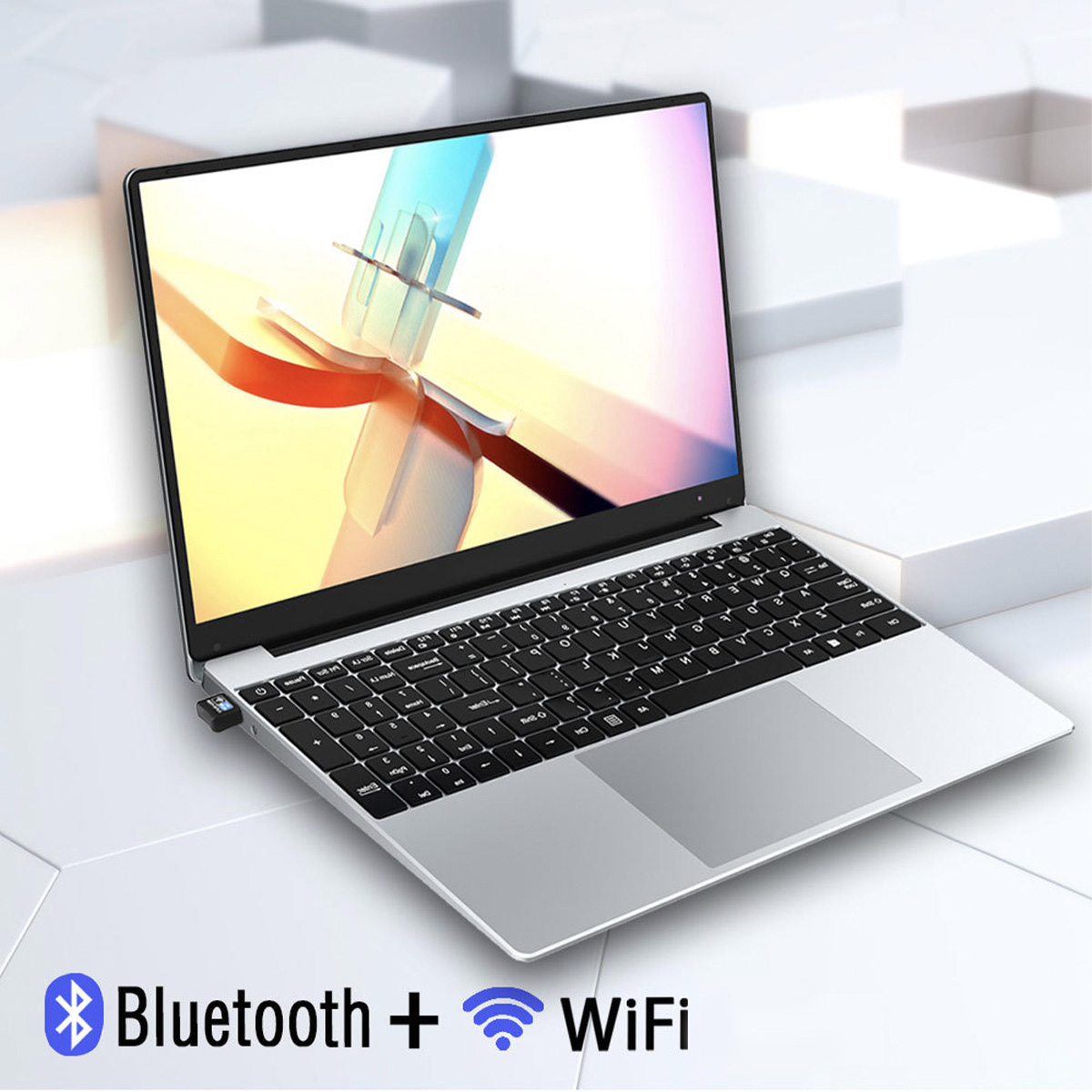 Ein Laptop ist auf einer weißen Oberfläche geöffnet. Bluetooth- und WLAN-Symbole werden unter dem Laptop angezeigt.