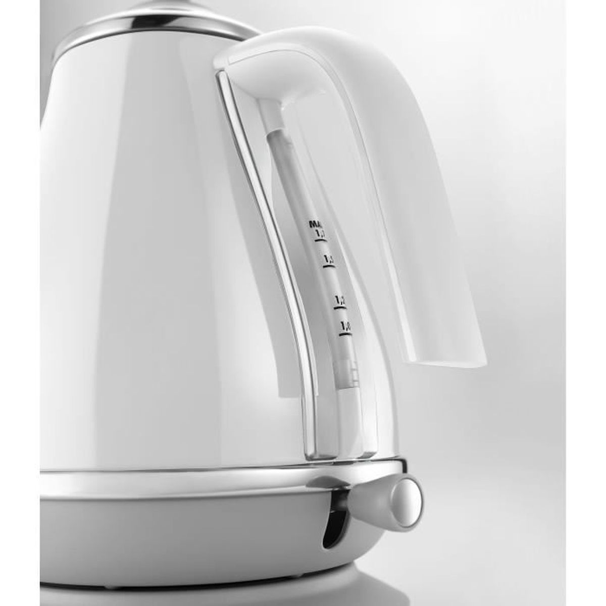 White electric kettle showing water level and handle.