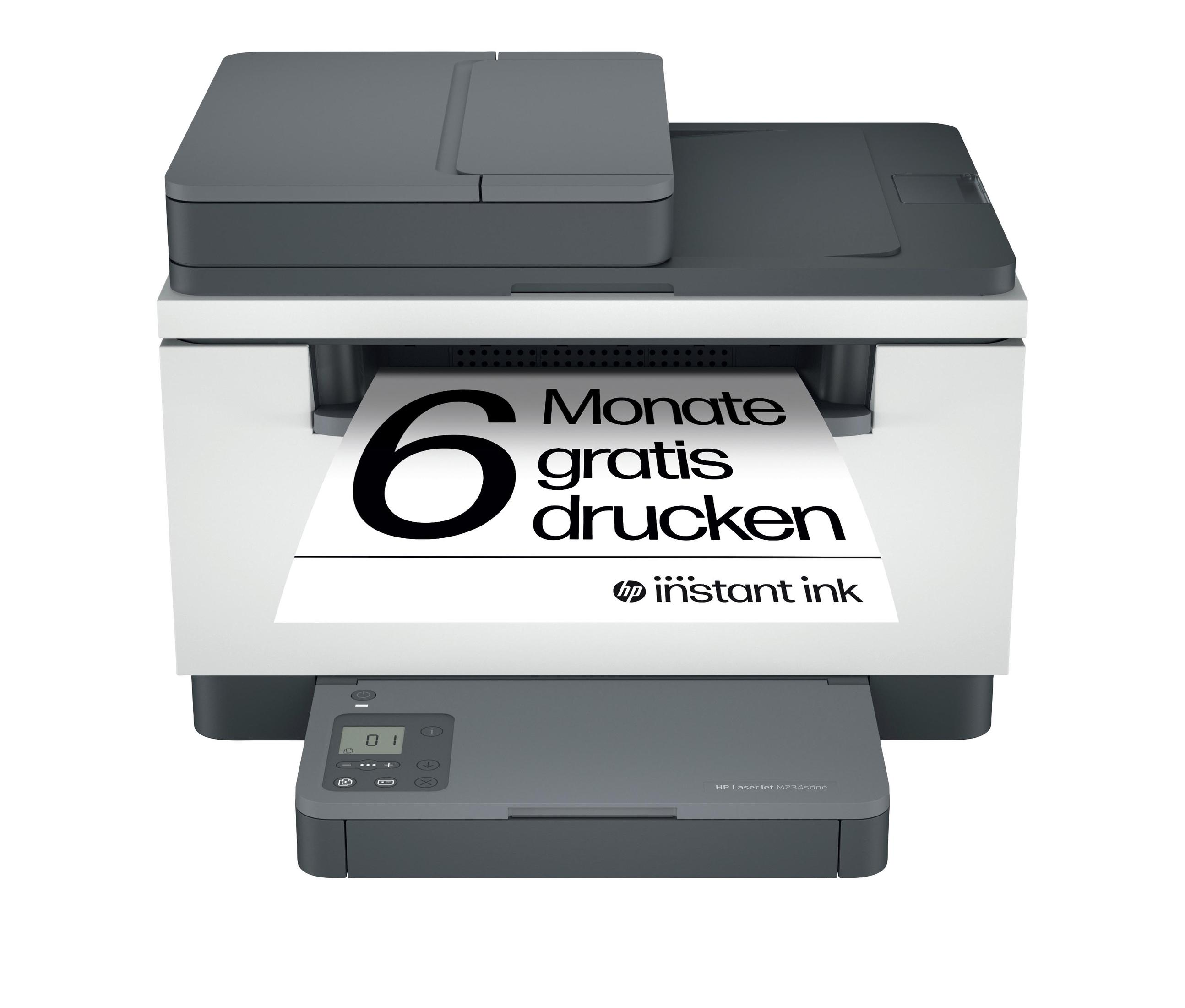 Biało-szara drukarka HP z wyjściem papieru z tekstem '6 Monate gratis drucken'.