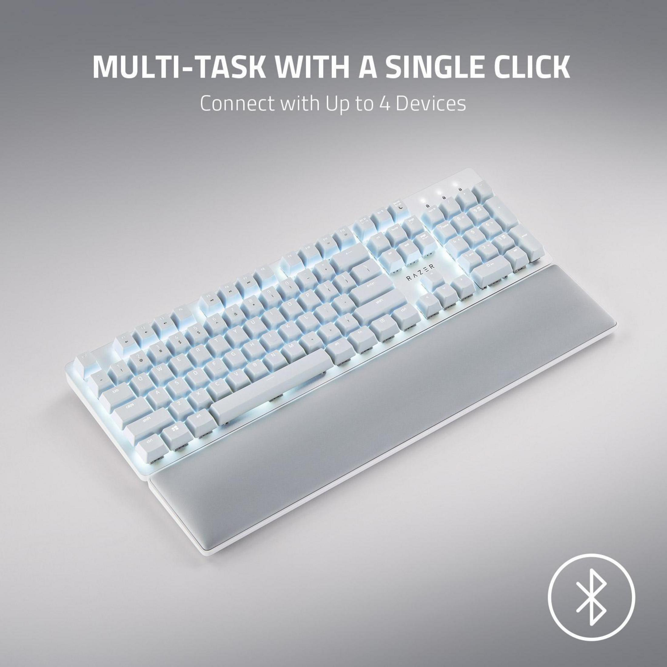 Weiße Tastatur mit Handgelenkauflage. Die Tastatur hat eine weiße Hintergrundbeleuchtung.
