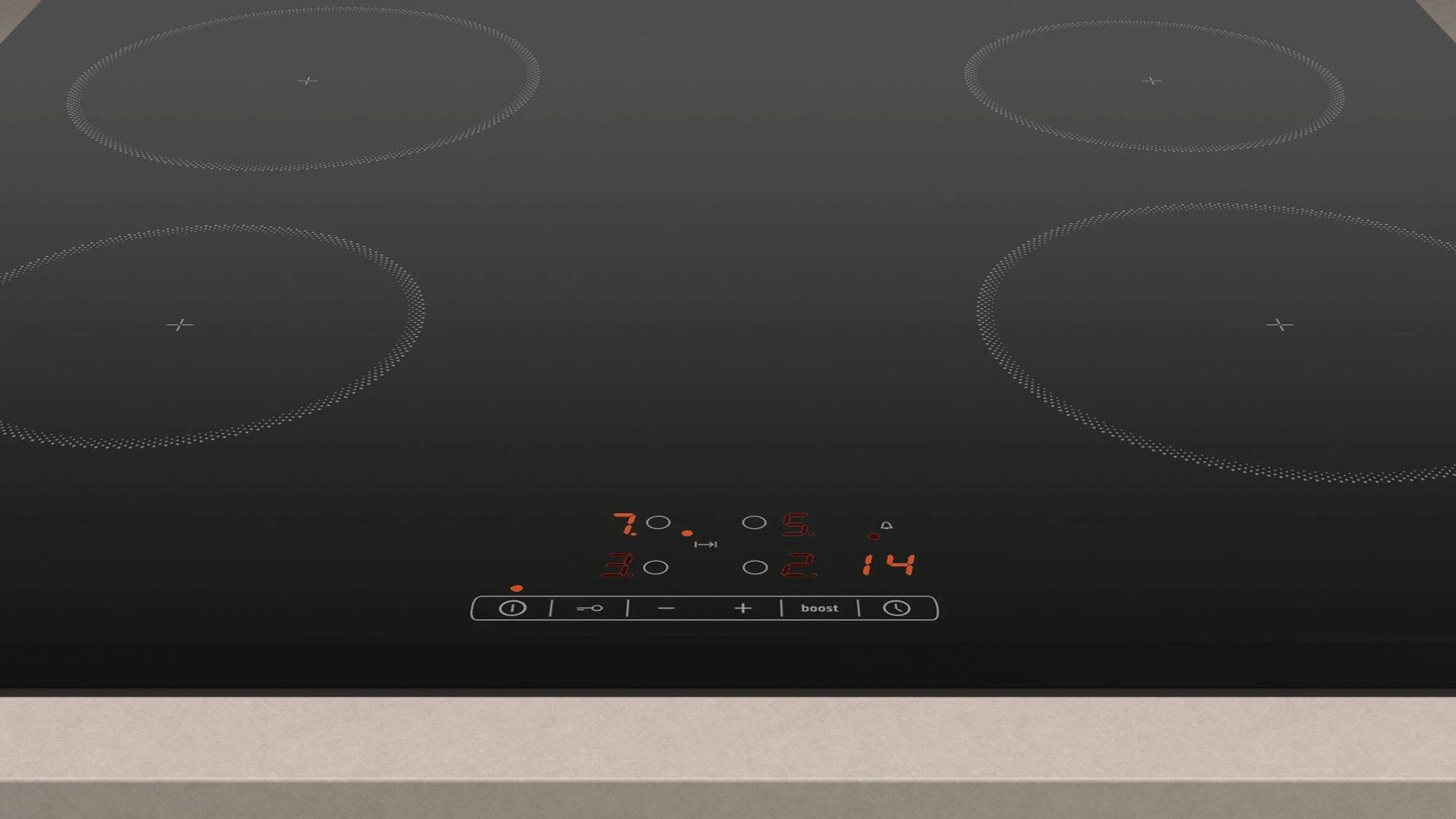 Black induction hob with four circular cooking zones and digital controls displaying numbers and symbols.