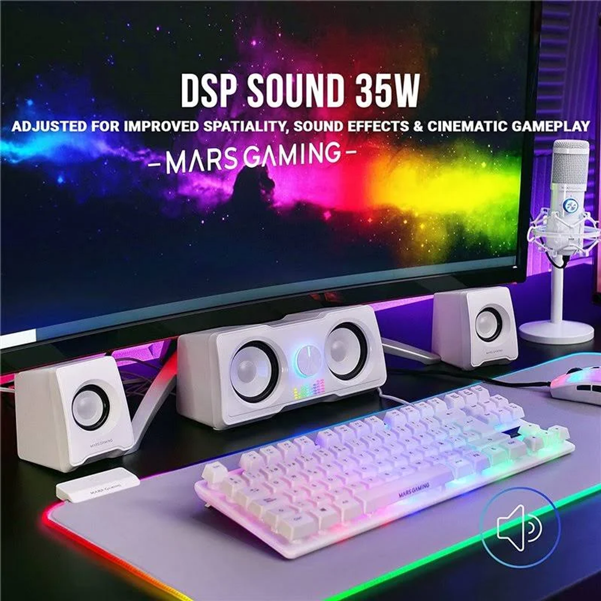 Configuración de juego con altavoces, teclado y un monitor que muestra gráficos coloridos.