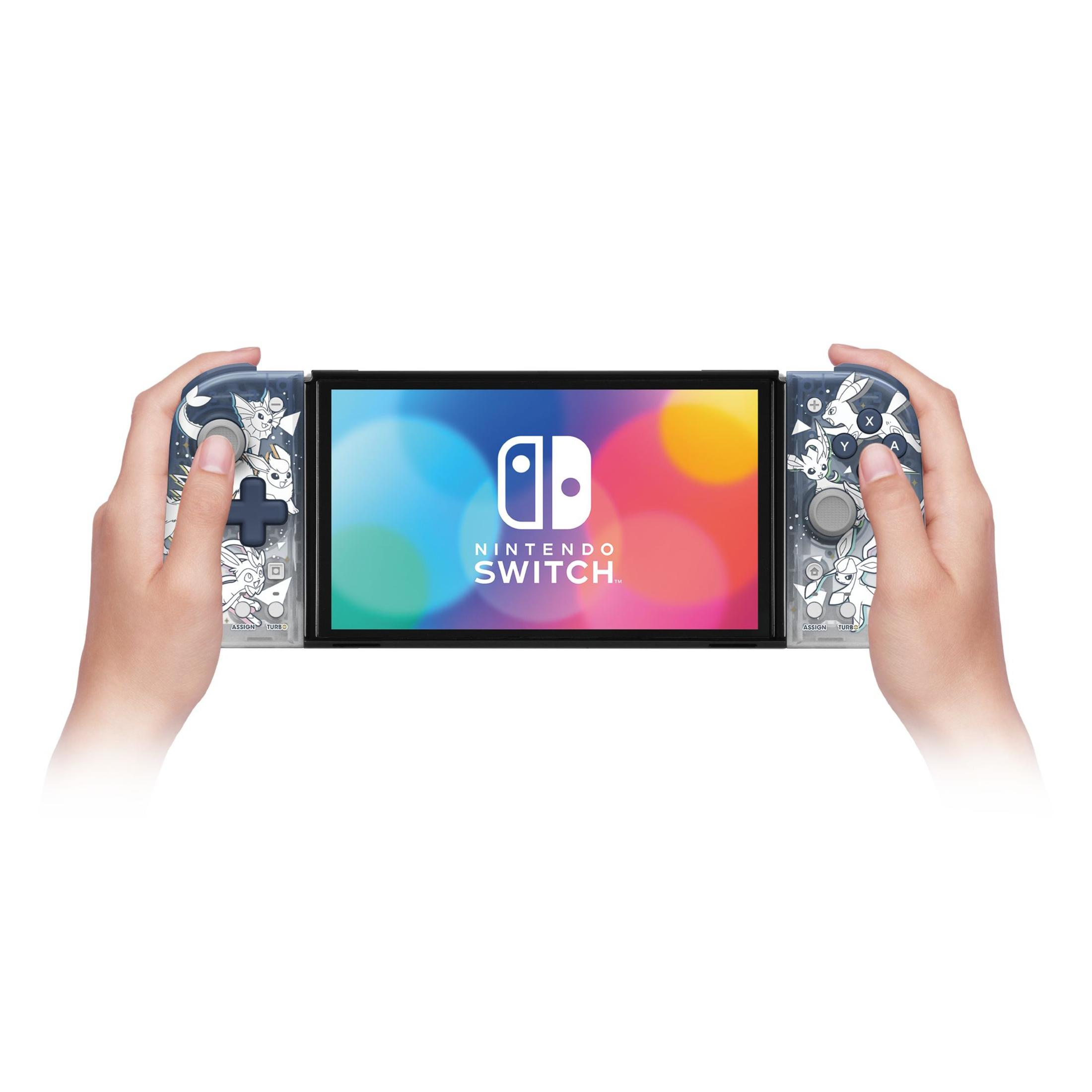 Dłonie trzymające Nintendo Switch z wystylizowanymi Joy-Conami, wyświetlając ekran gry.