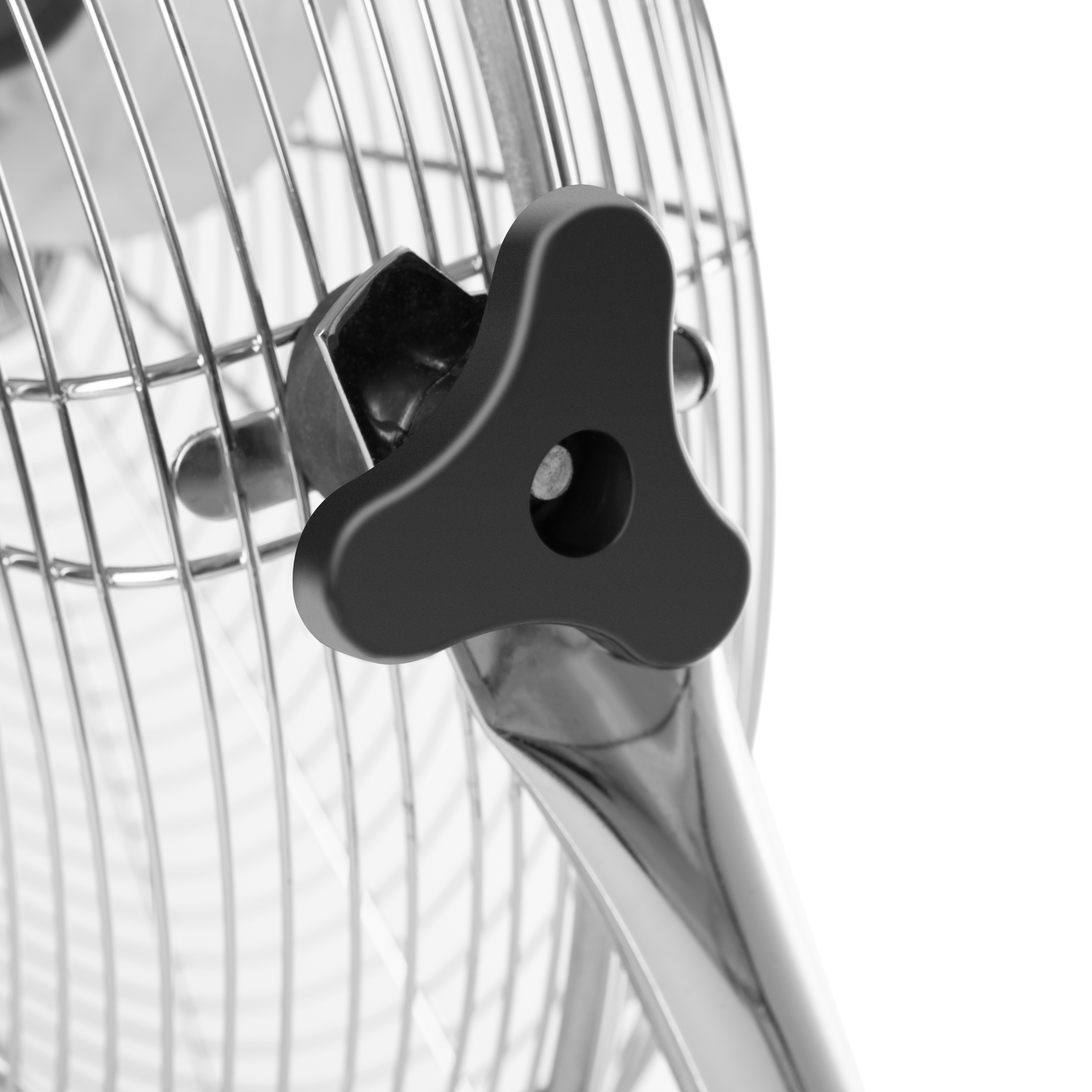 Czarny pokrętło z trzema skrzydełkami, przymocowane do metalowego wentylatora.