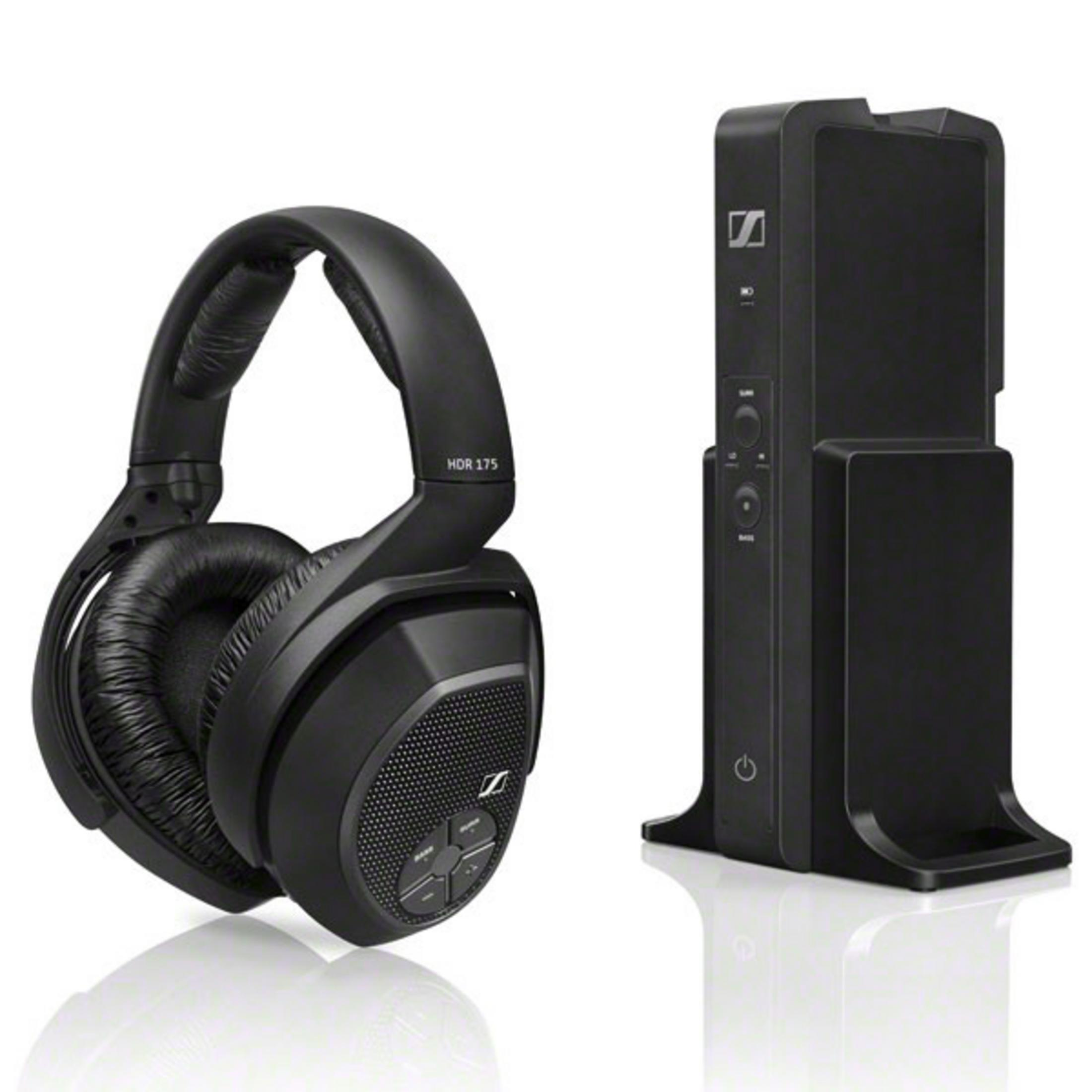Auriculares negros y una estación de carga negra. Los auriculares a la izquierda.
