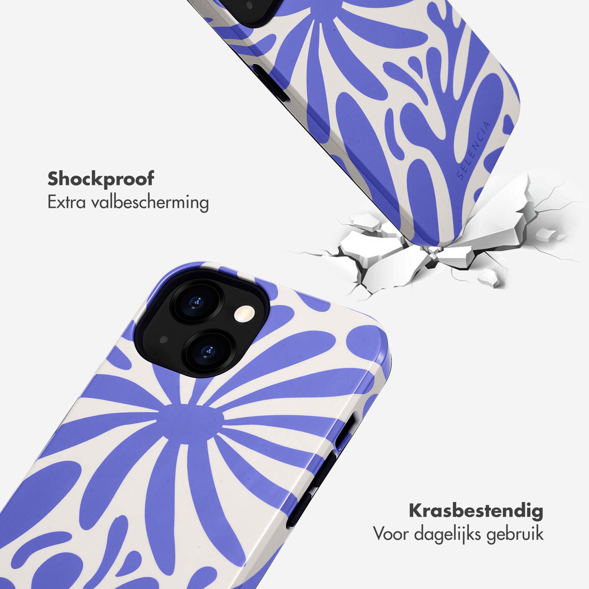 Une coque de téléphone à motif violet et blanc tombe sur un sol craquelé.
