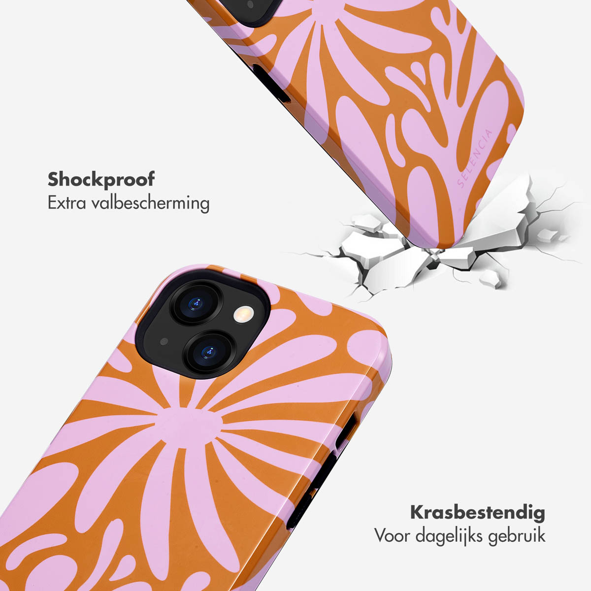 Twee telefoonhoesjes met oranje en roze bloemenpatroon, een valt.
