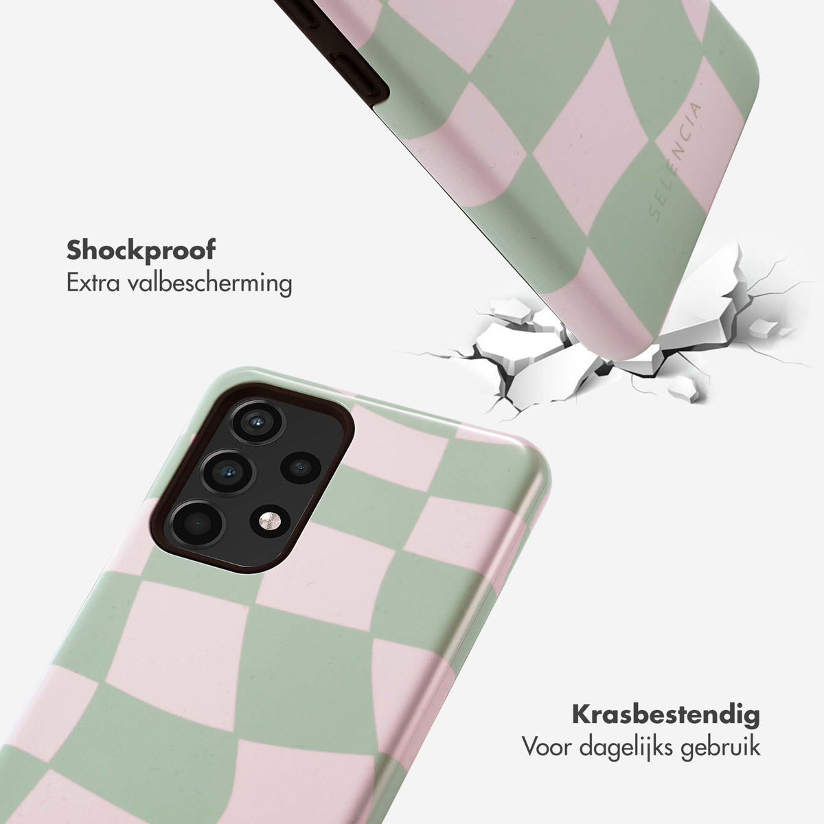 Telefoon met groen en roze geruite hoes. Hij valt en barst.