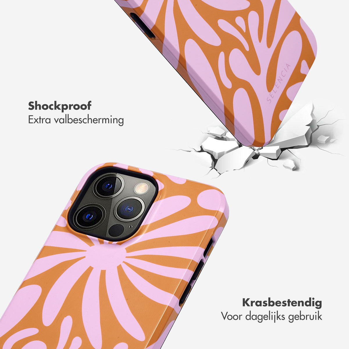 Twee roze en oranje bloemen telefoonhoesjes. Eén valt, de andere zit op een telefoon.
