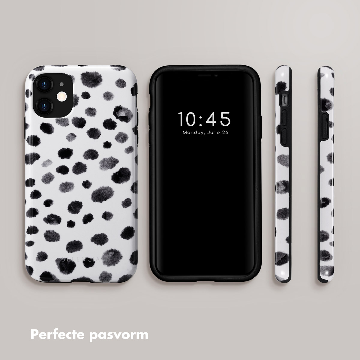 Un téléphone avec des taches d'encre noire sur fond blanc, et un téléphone avec écran noir affichant l'heure.