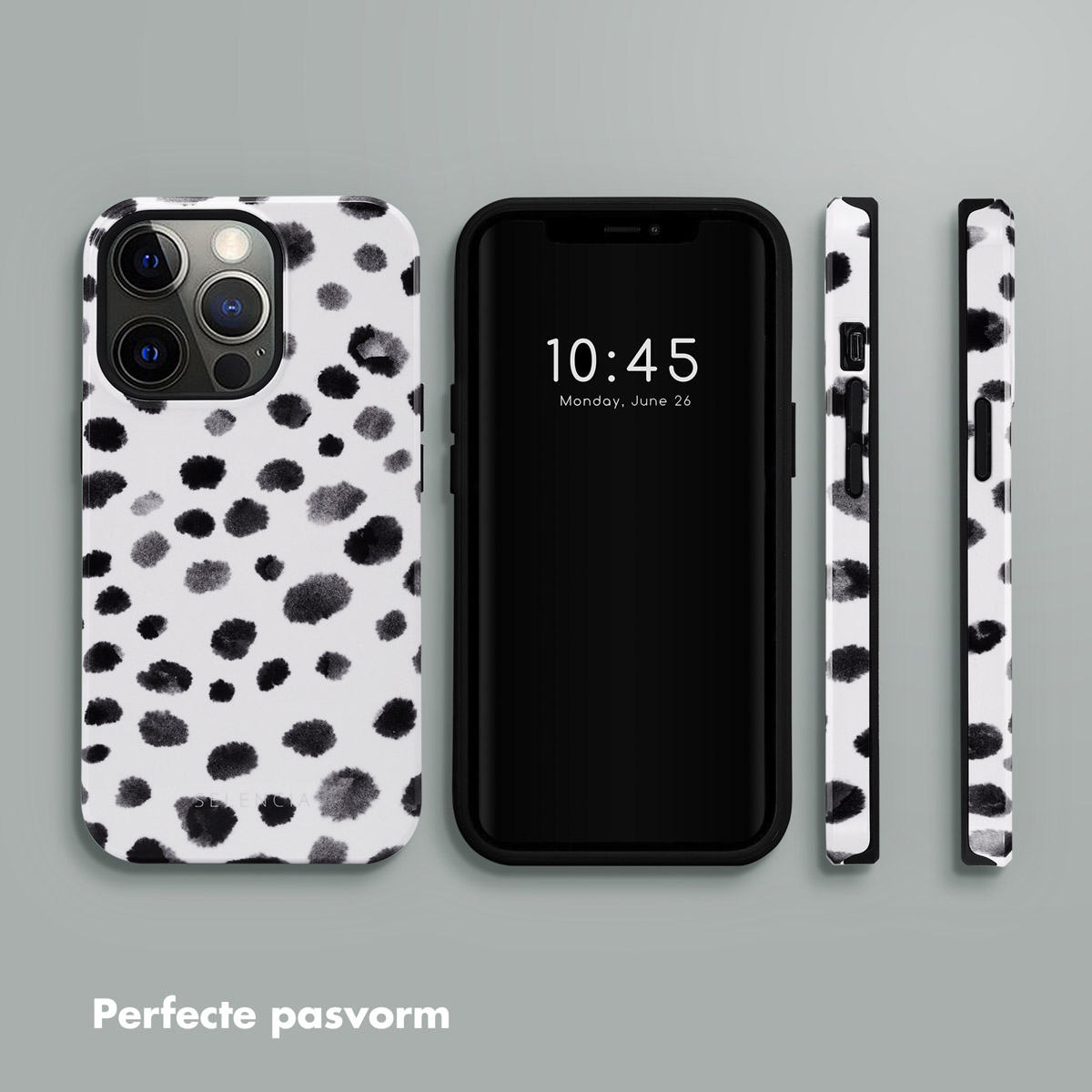 Telefoon met zwart-wit gestippelde hoes. Zwarte telefoon die de tijd toont. Extra gestippelde hoesjes.