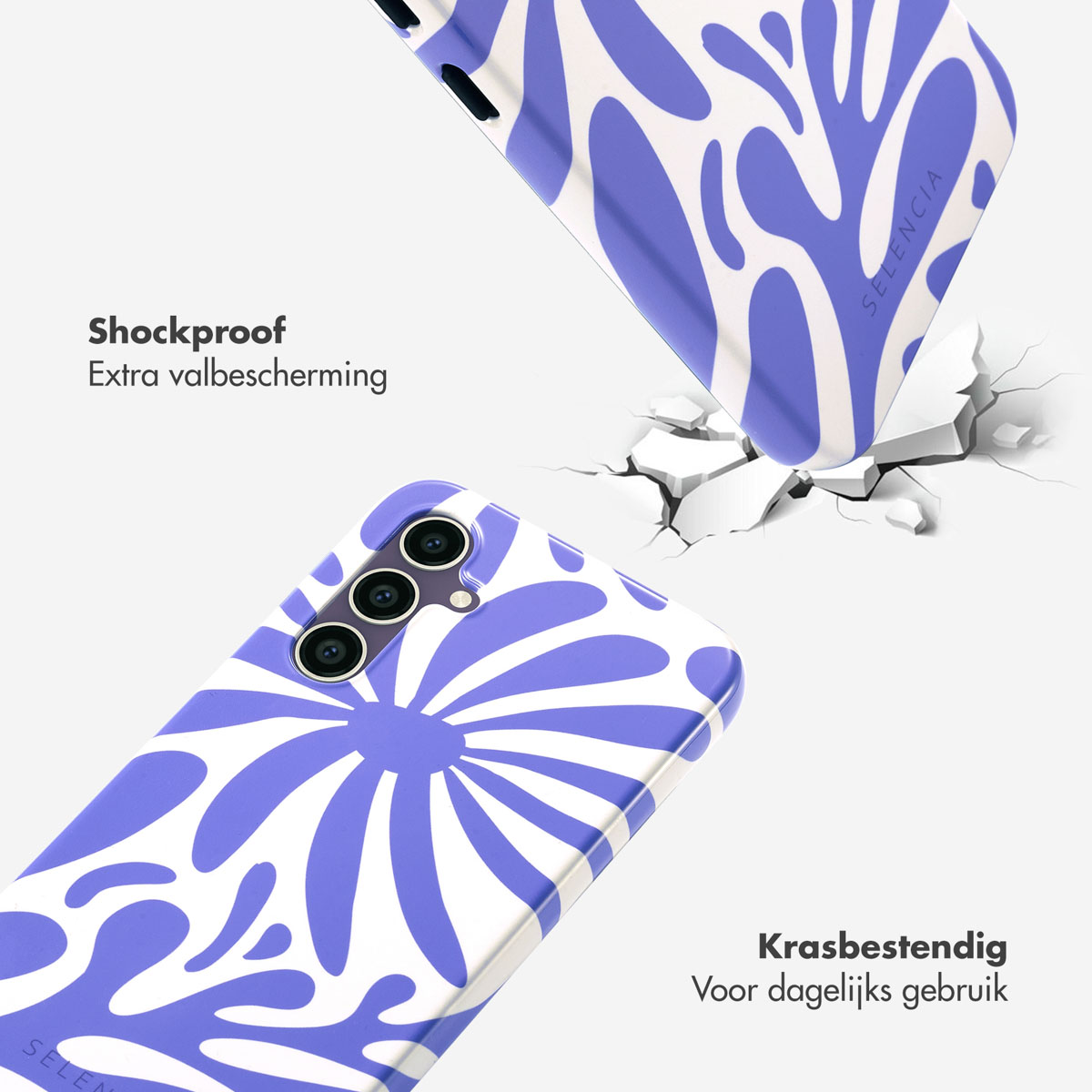 Telefoonhoesjes met een paars-wit bloemenpatroon. Eén hoesje valt, één op de grond.