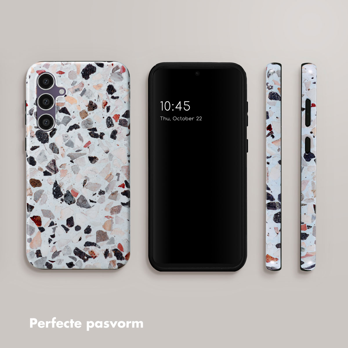 Telefoon en hoesjes met een terrazzo patroon. De telefoon toont de tijd. Hoesjes zijn wit, grijs en rood.