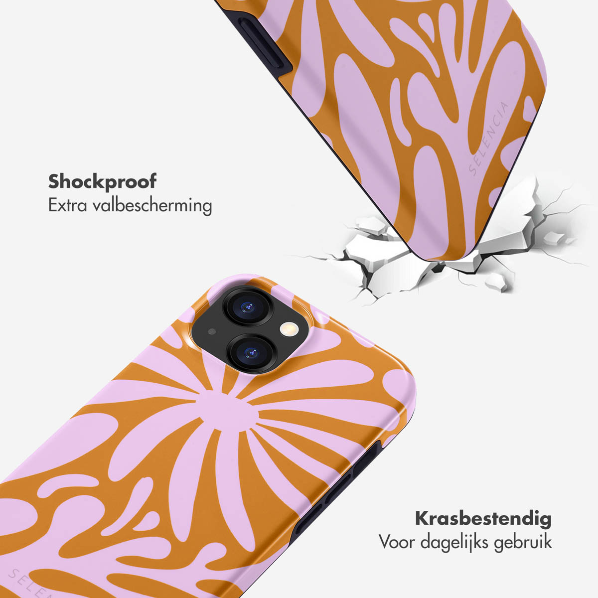 Deux coques de téléphone avec un motif floral. L'une tombe, l'autre est au sol. Le fond est blanc.
