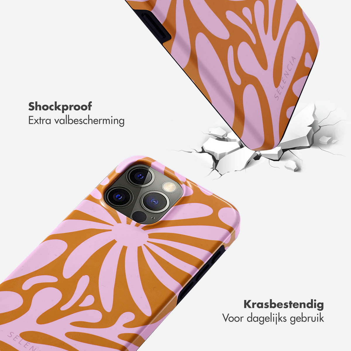 Telefoonhoesjes met roze en oranje bloemenpatroon, één valt.