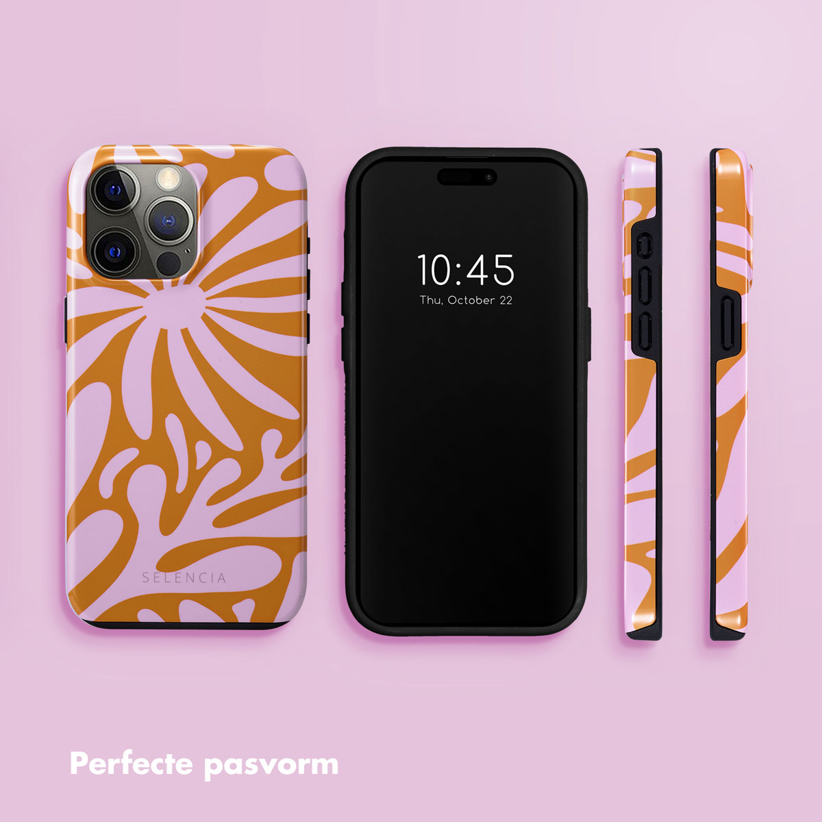 Een telefoon met bloemenhoes, met twee hoezen ernaast.
