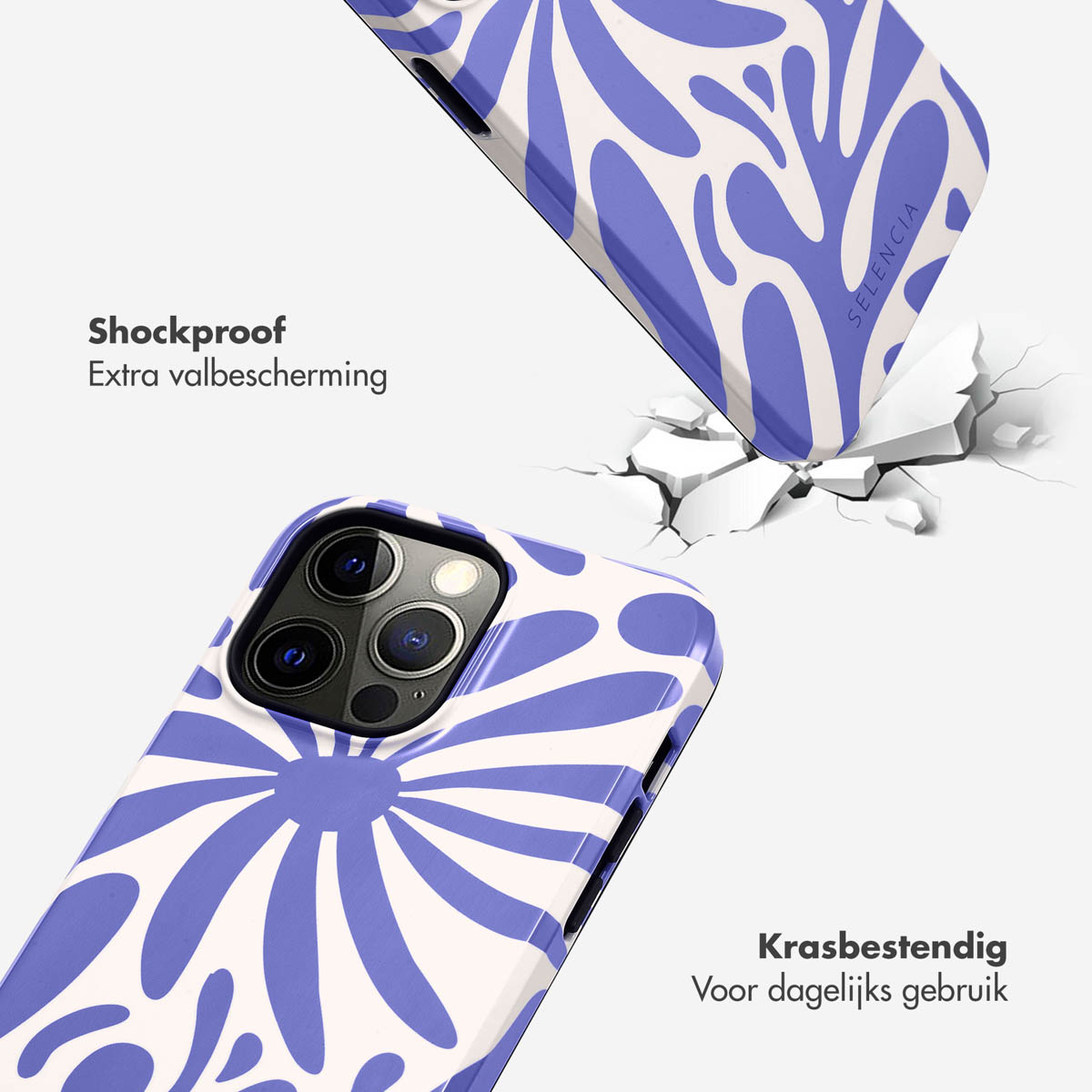 Telefoonhoesje met een blauw bloemenontwerp. Hoes valt en barst de grond.