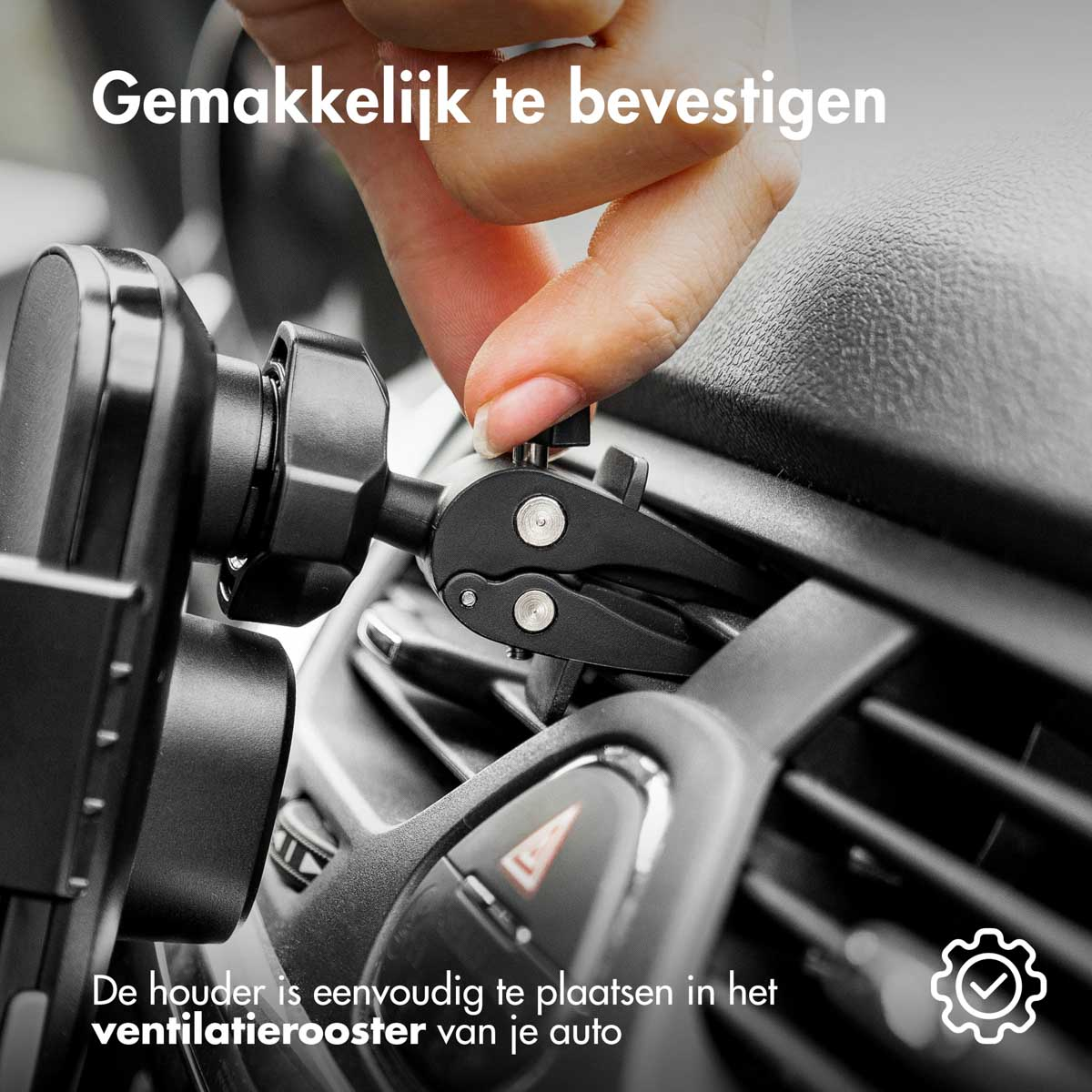 Hand attaching a phone mount to a car vent, illustrating easy installation.