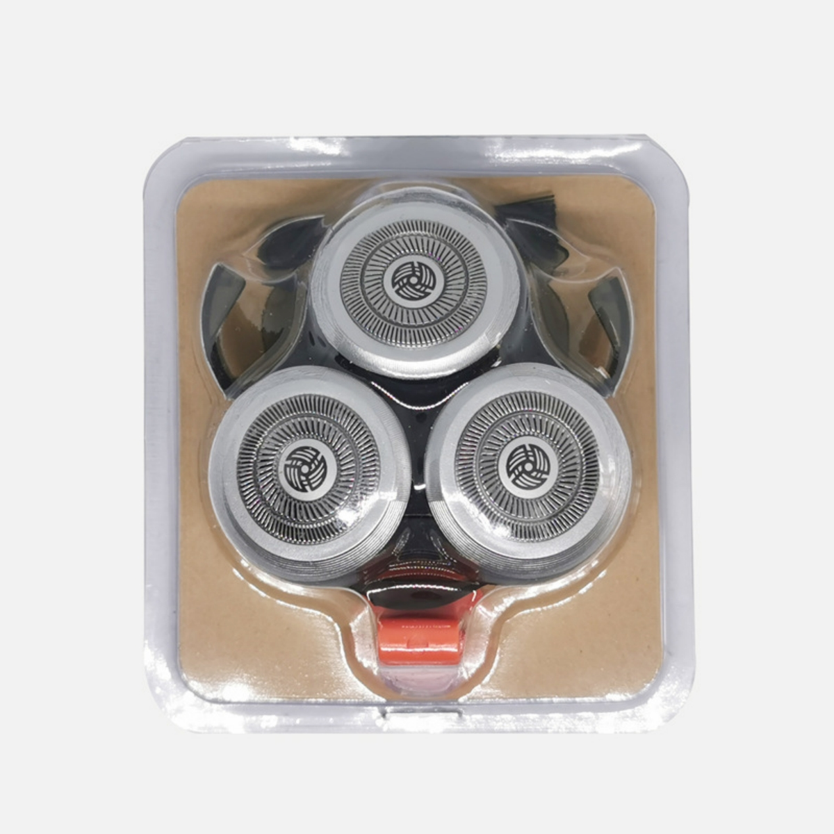 Drei silberne Rasierköpfe in einem transparenten Kunststoffbehälter mit brauner Kartonrückseite.