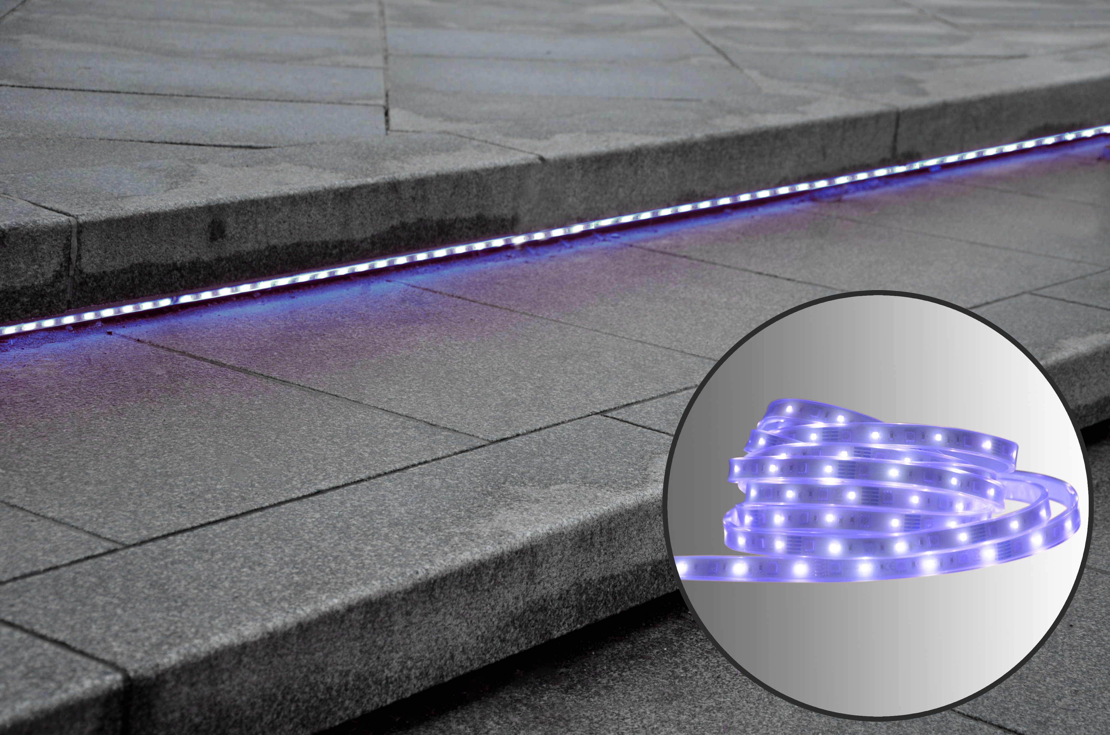 LED-Lichtband auf einer grauen Steinoberfläche installiert. Eine Nahaufnahme zeigt die Lichter.